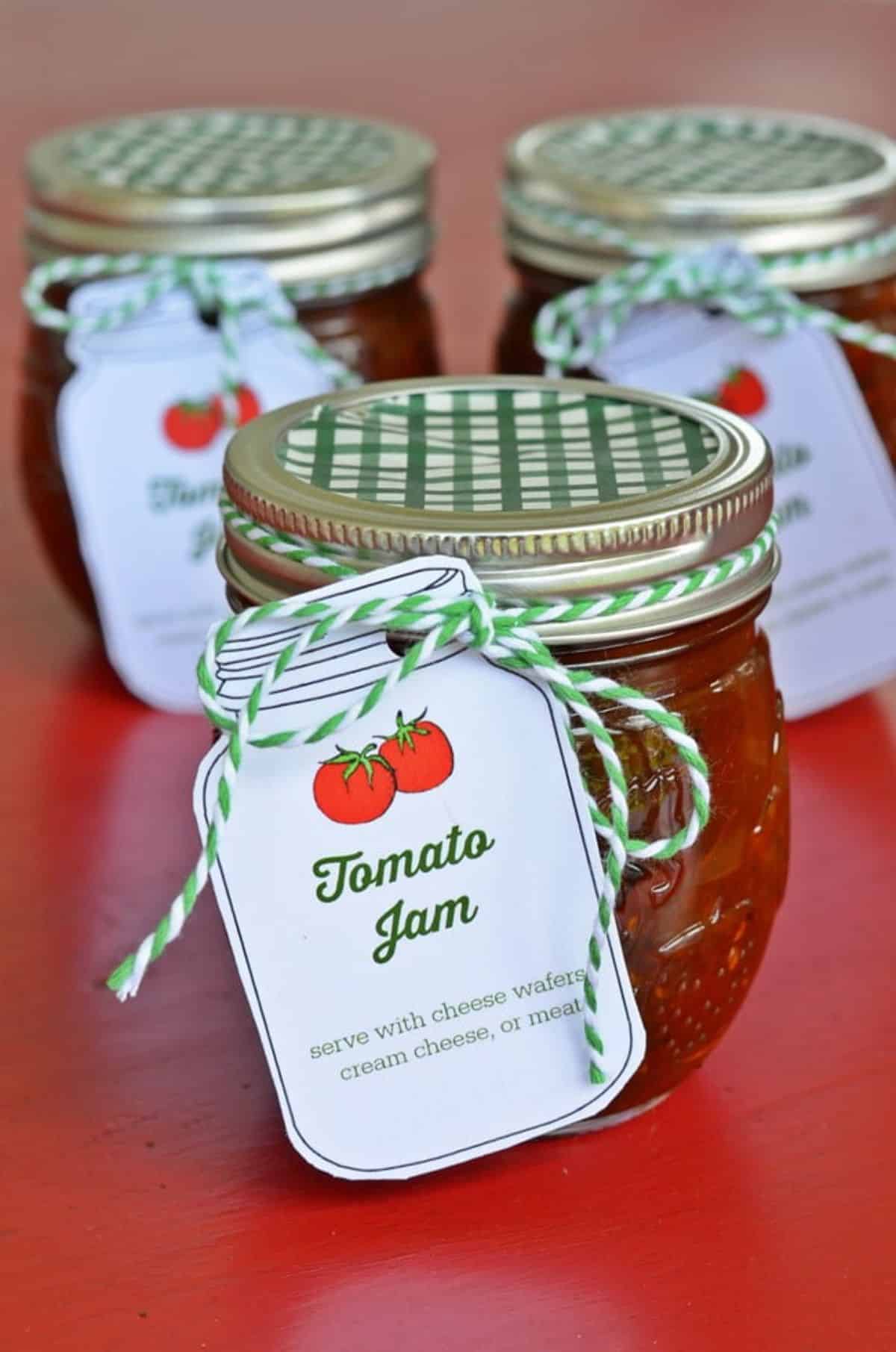 Homemade tomato jam in glass jars.