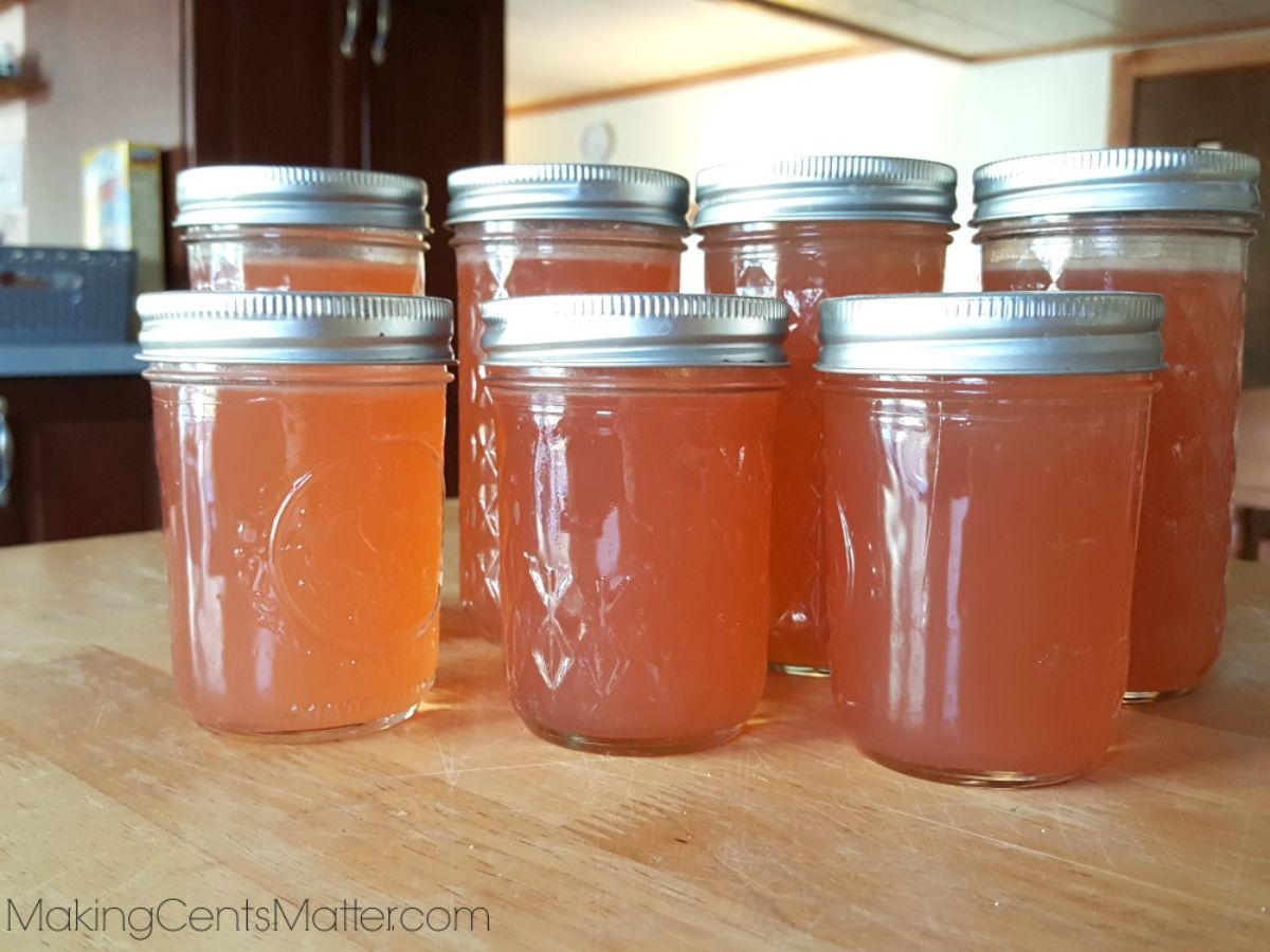 Apple peel jelly canned in glass jars.