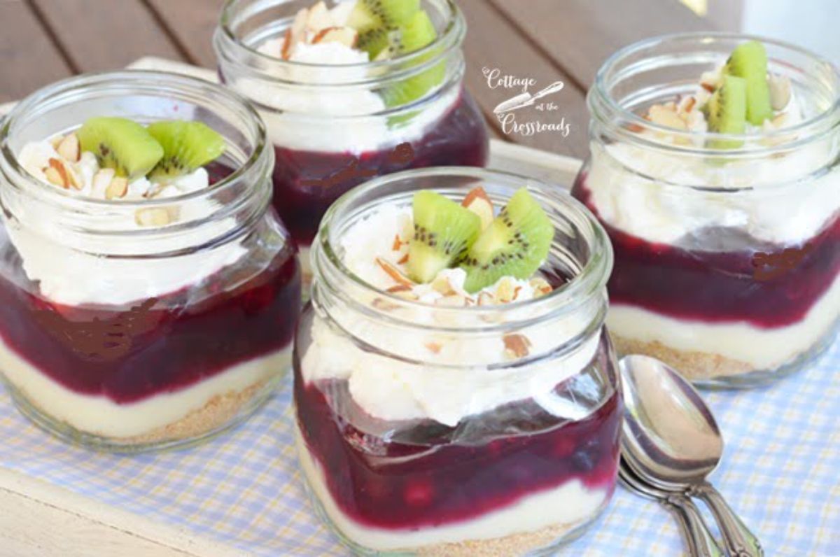 Delicious no bake blueberry cheesecake in glass jars.