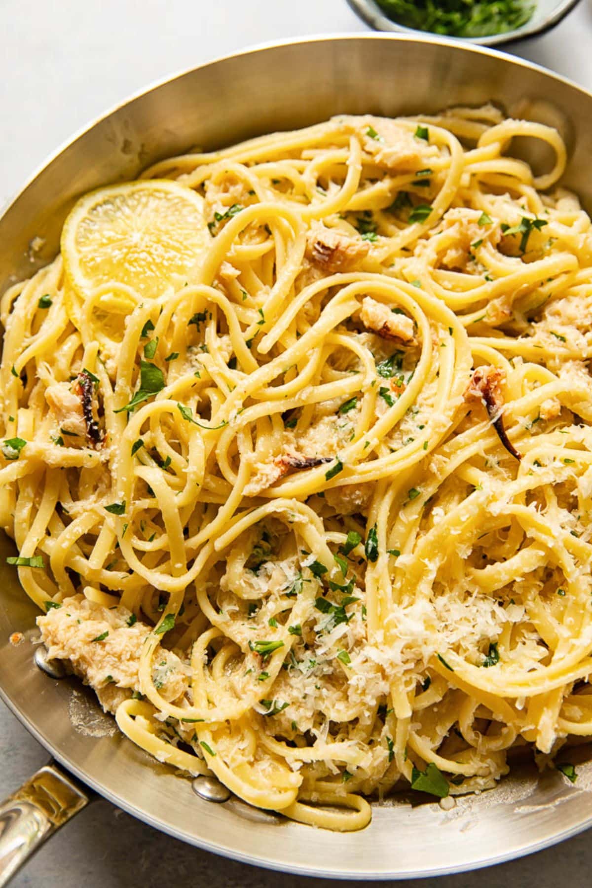 Delicious quick and easy crab pasta on a skillet.