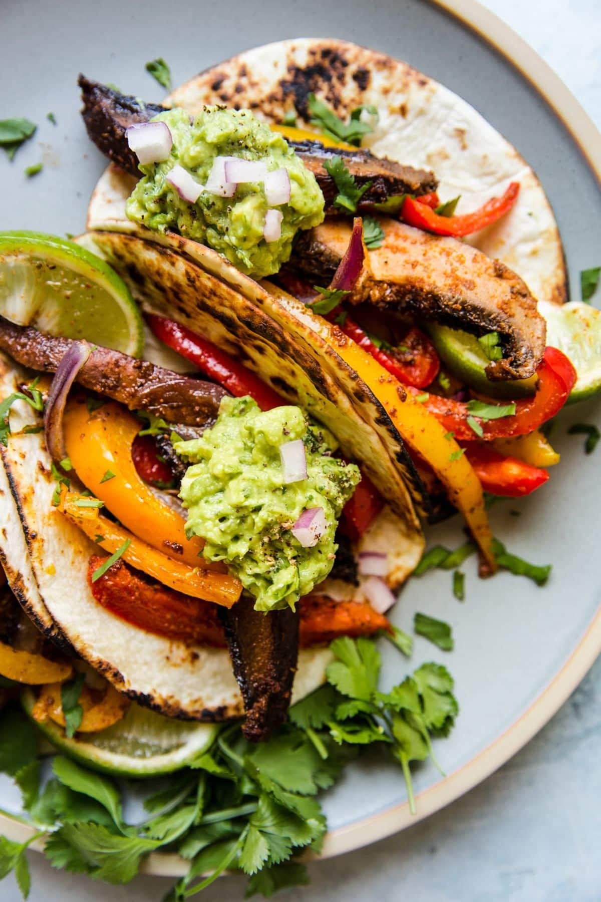 Scrumptious portobello mushroom fajitas on a tray.