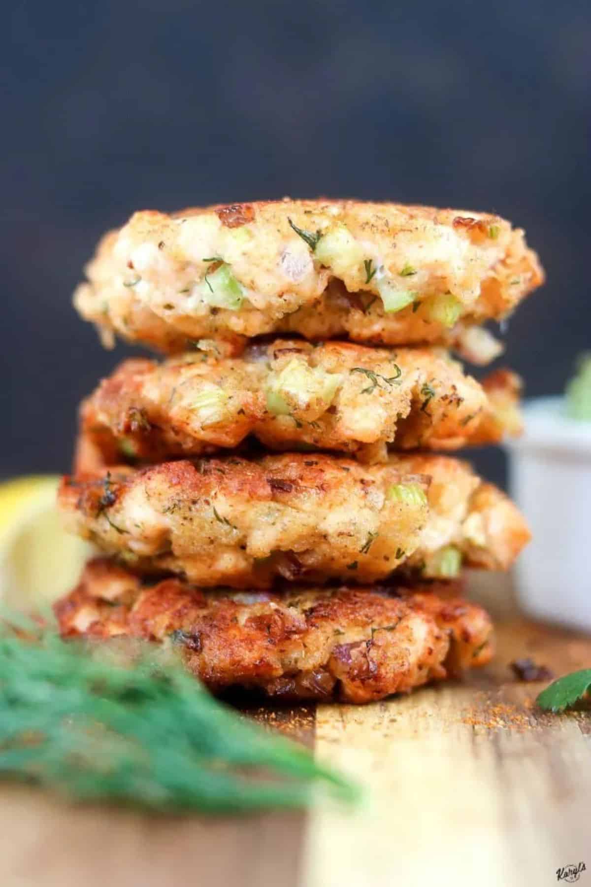 A pile of crispy old bay salmon cakes.