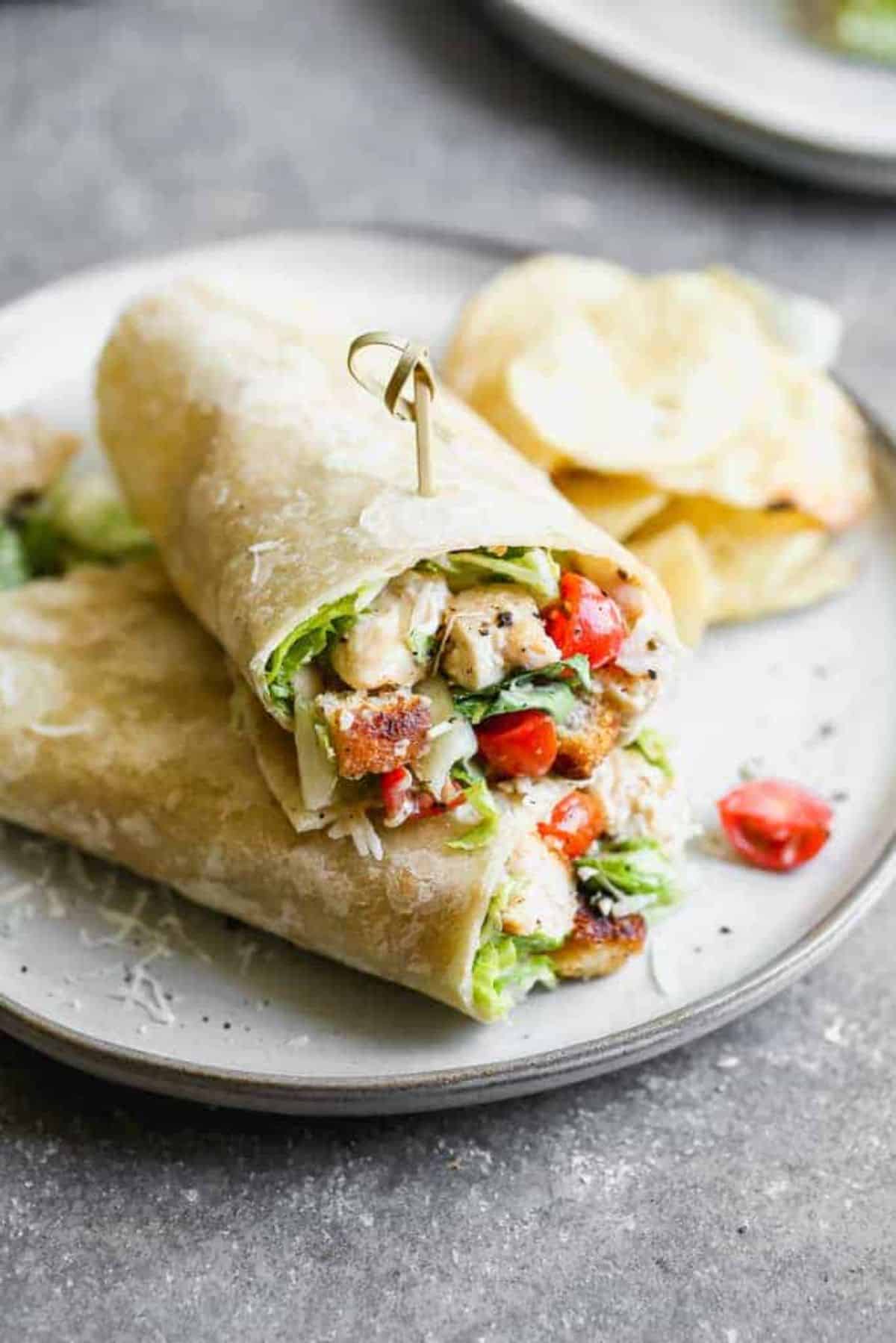 Scrumptious chicken caesar wraps on a plate.