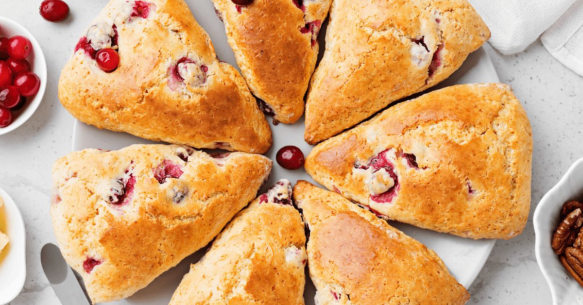 Mouth-watering scones on a white tray.