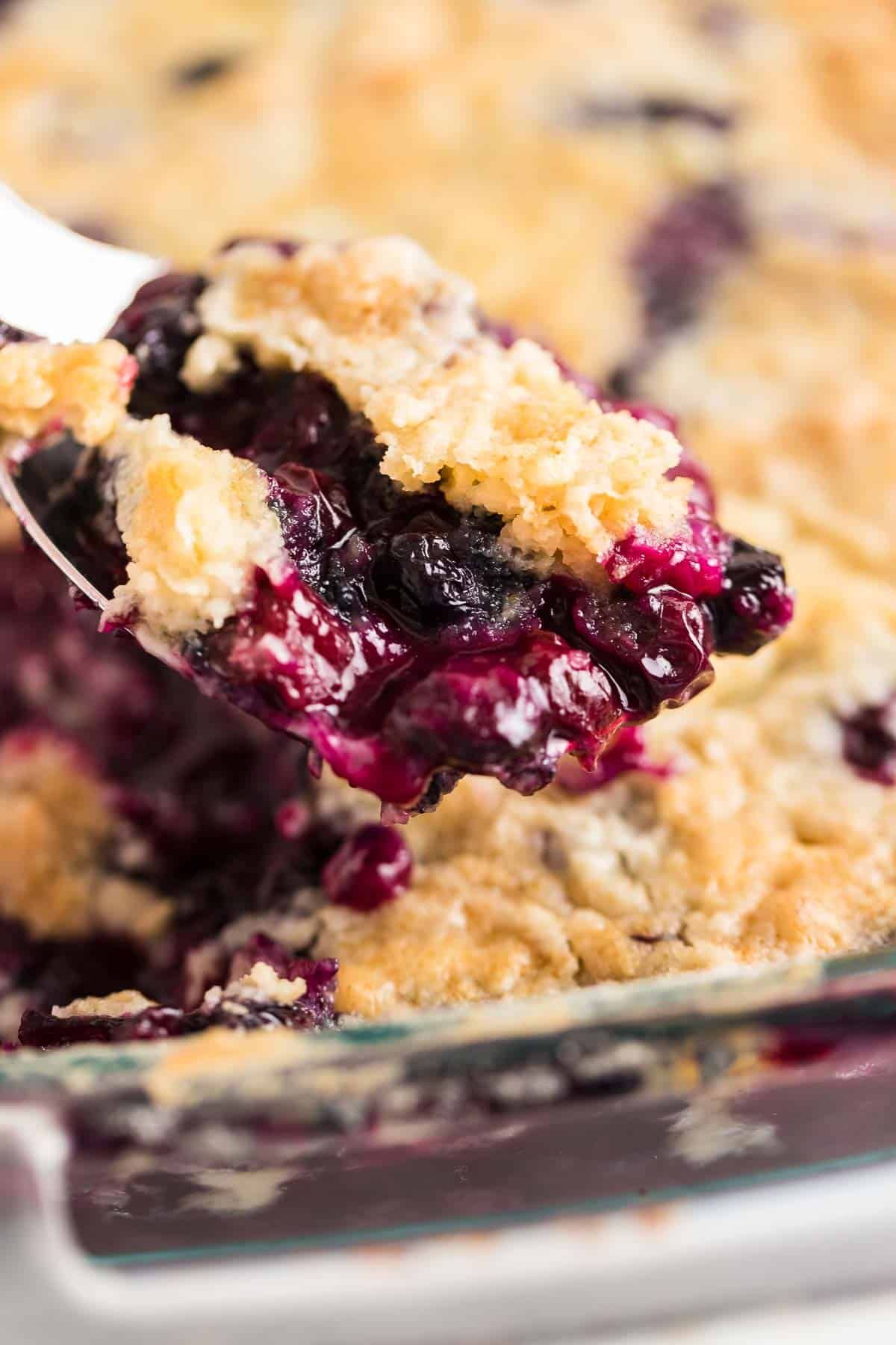 Juicy dump cake in a glass casserole.