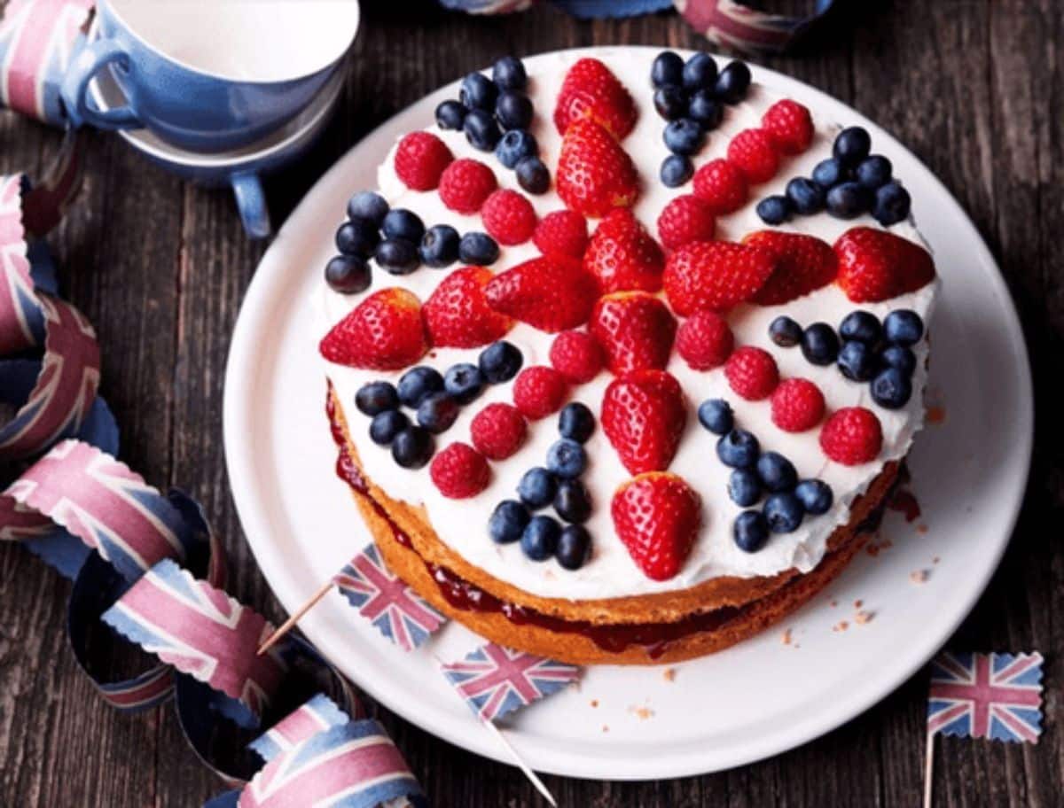 Scrumptious union jack cake on a white tray.