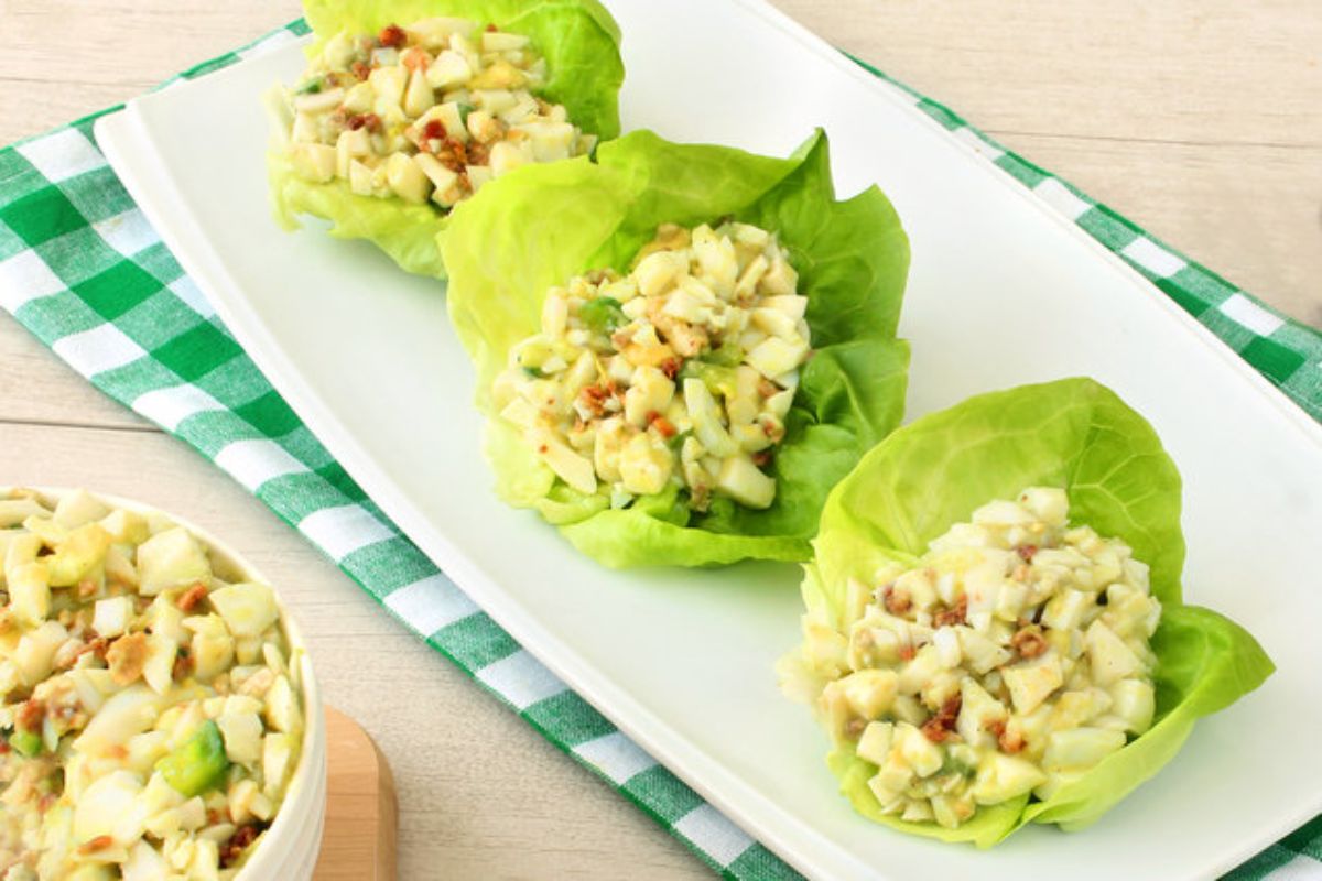 Flavorful avocado egg white salad on a white tray.