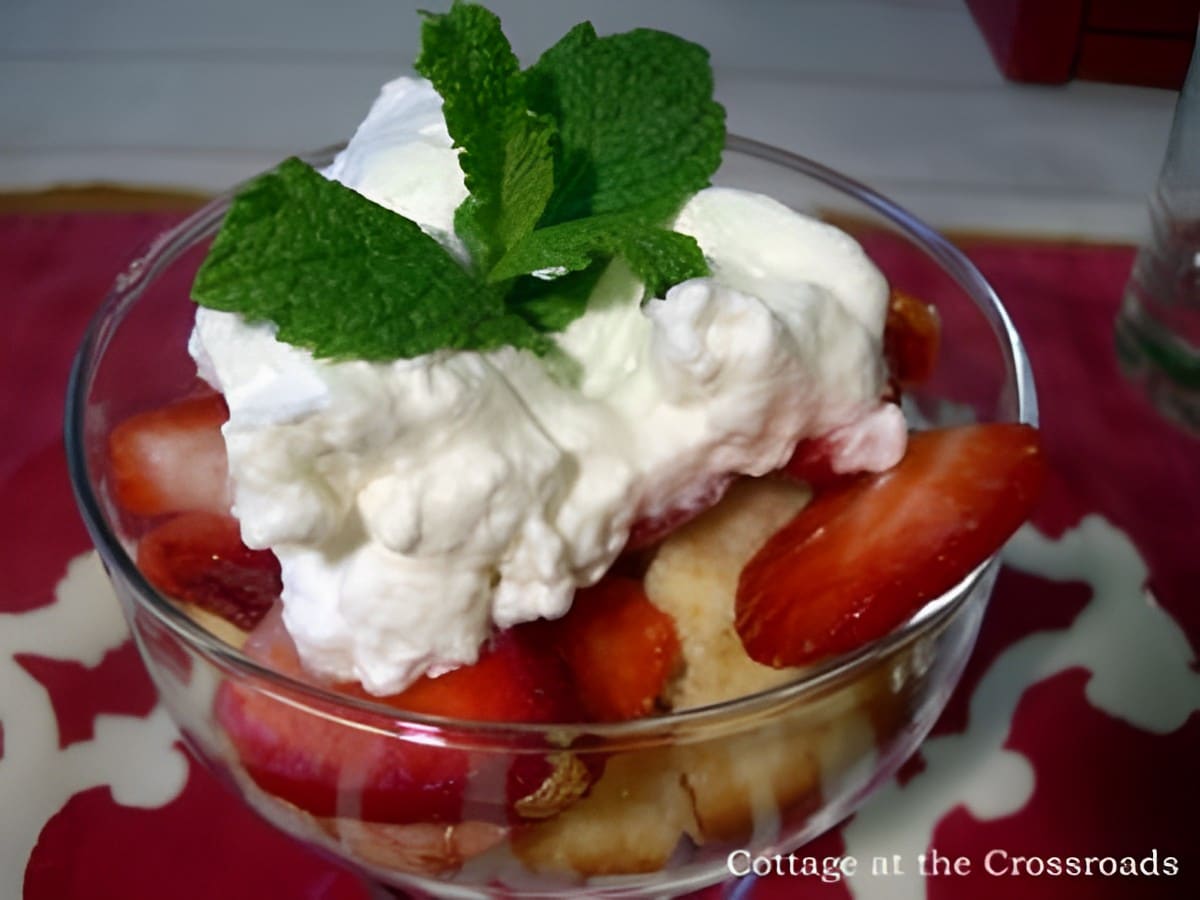 Mouth-watering strawberry shortcake in a glass bowl.