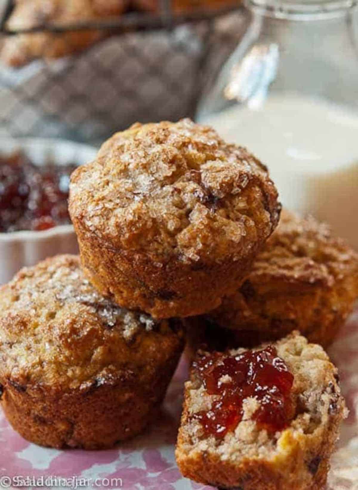 A pile of crispy strawberry muffins with a twist on a table.