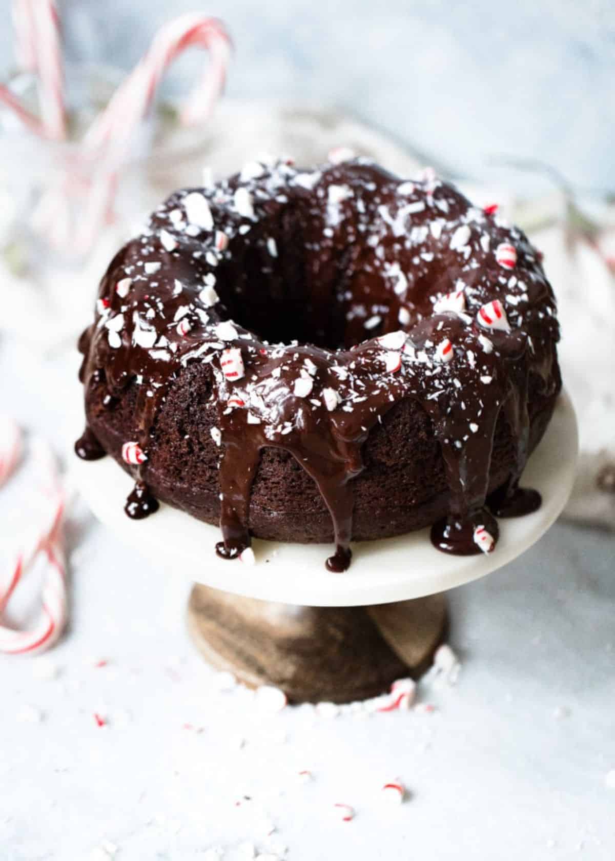 Scrumptious chocolate peppermint bundt cake on a cake tray.