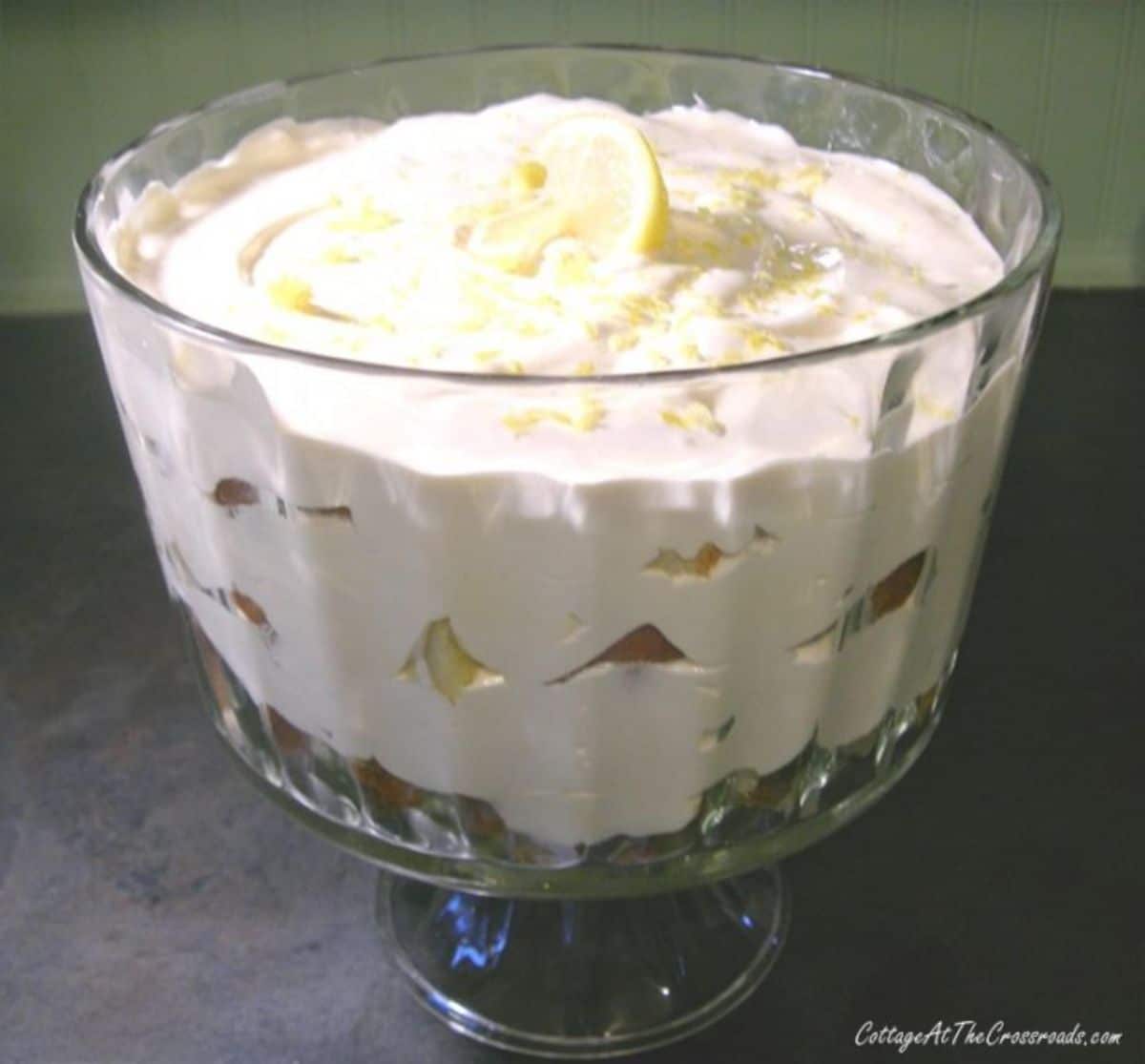 Creamy lemon silk dessert in a glass bowl.