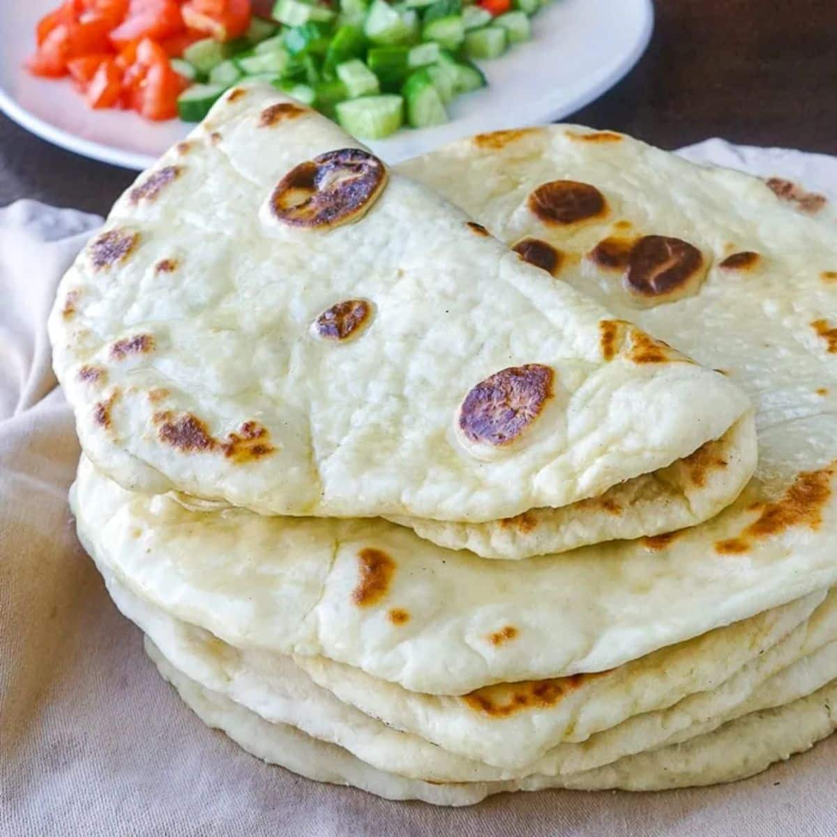 A pile of healthy yogurt flatbreadson a table.