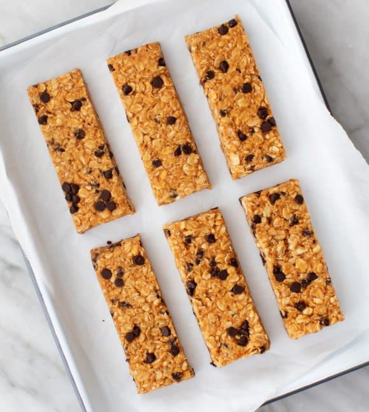 Healthy homemade granola bars on a baking tray.