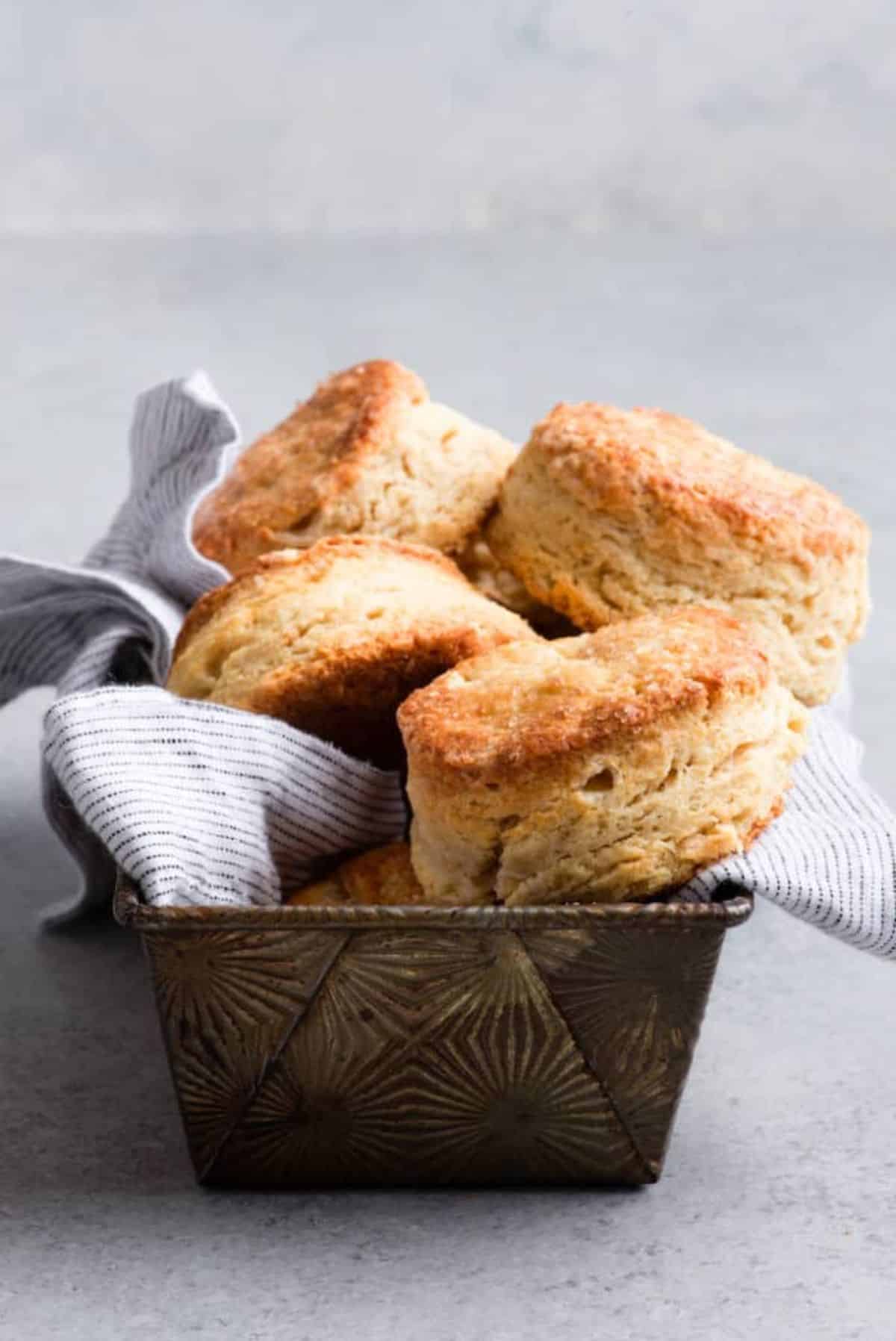 Crunchy sour cream biscuits in a basket.