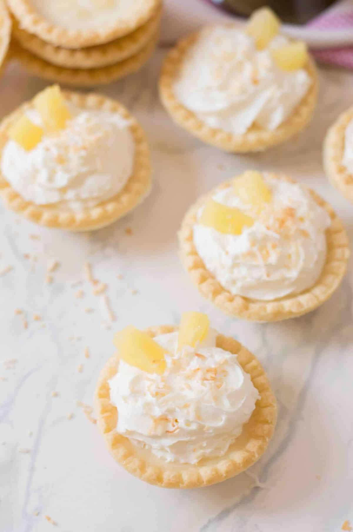 Crispy mini pineapple tarts on a tray.