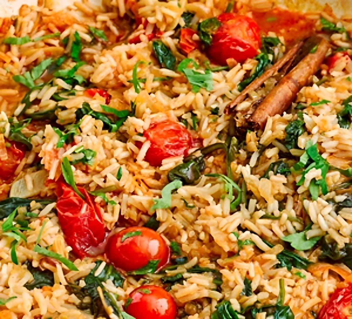 Healthy lemon, spinach, and tomato pilaf.