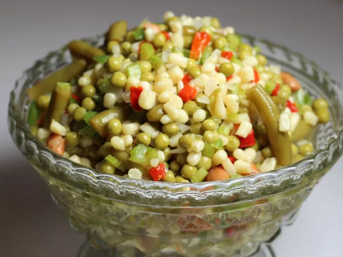 Flavorful marinated salad in a glass bowl.