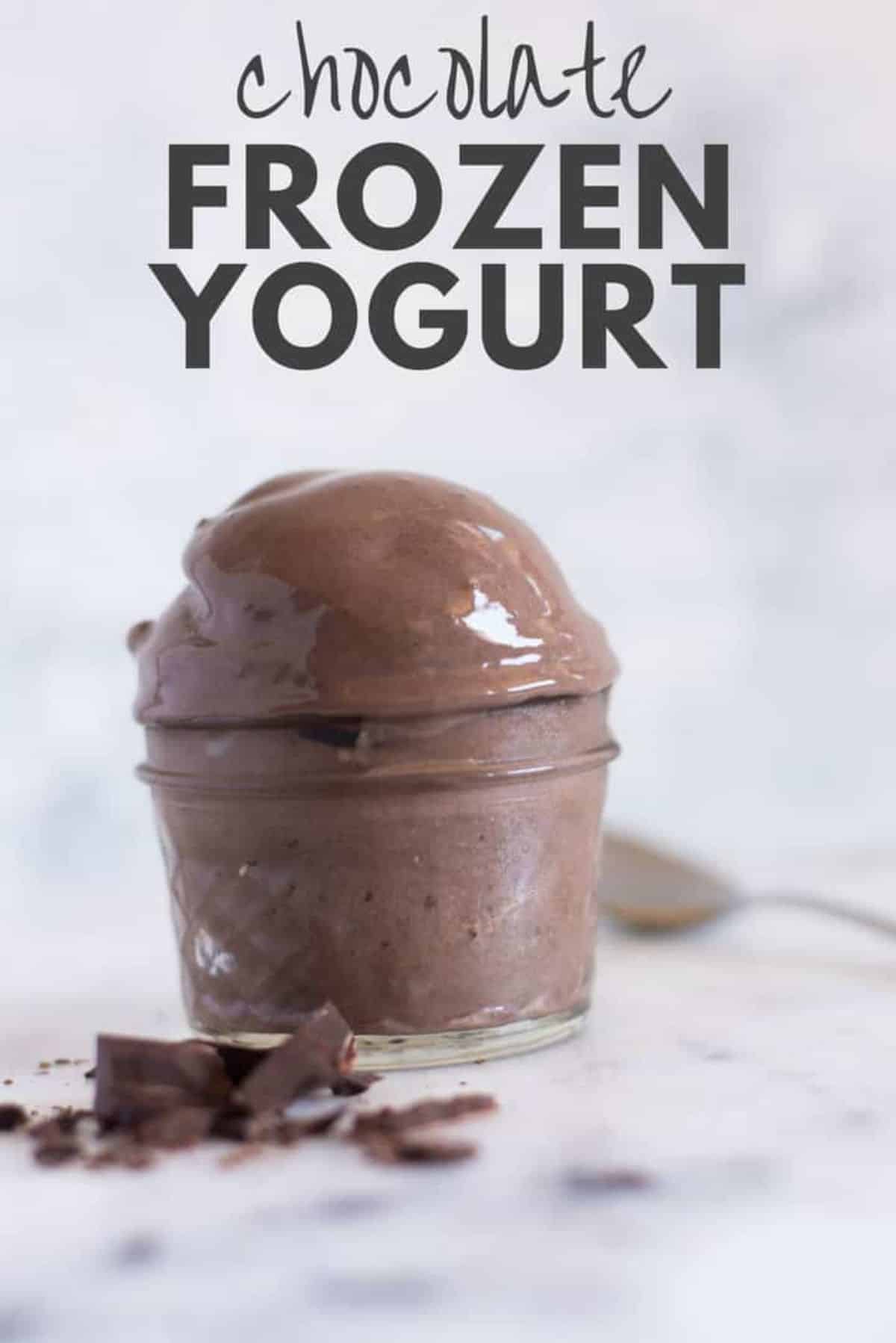 Mouth-watering chocolate frozen yogurt on a glasss shot.