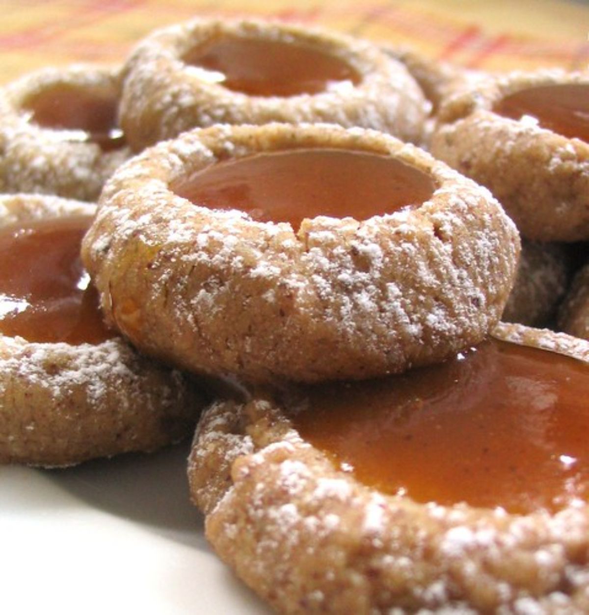 Scrumptious pumpkin butter thumbprints on a table.