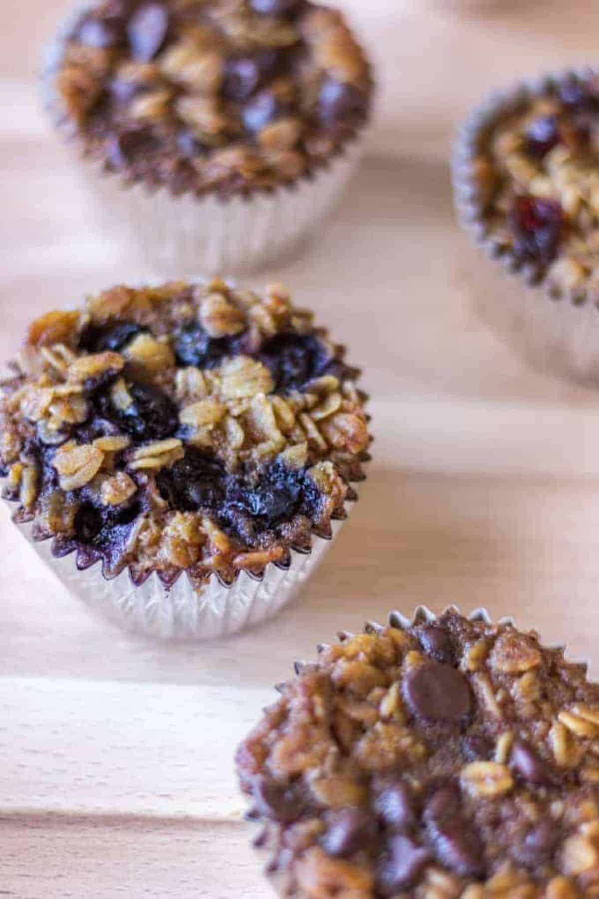 Scrumptious to-go baked oatmeal on a wooden tray.