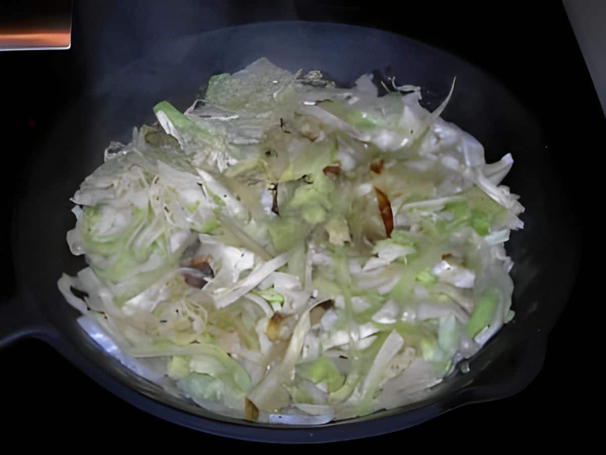 Healthy ina garten's sauteed cabbage in a black bowl.