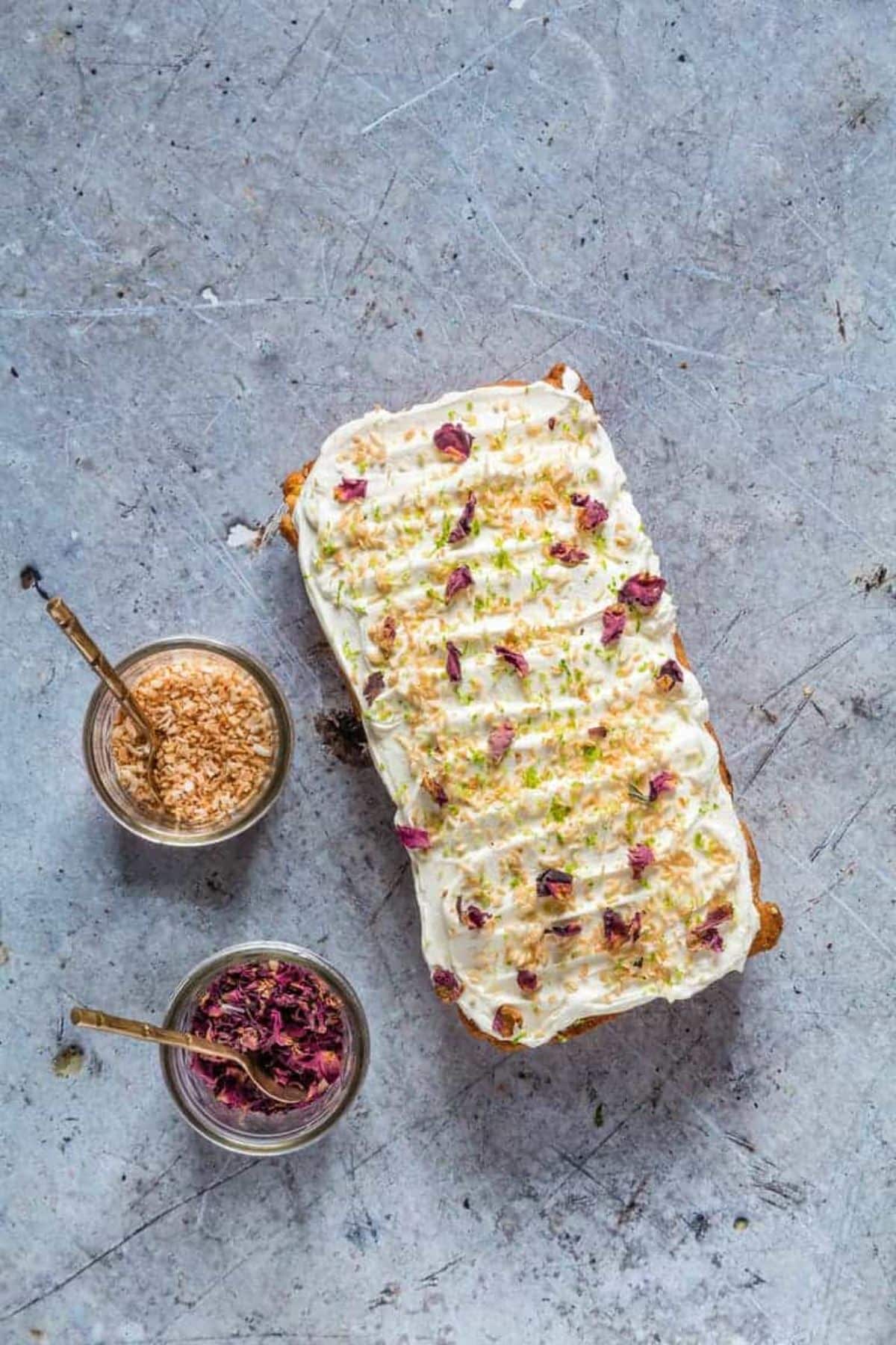 Flavorful lime, mango, and pineapple loaf cake in a tray.