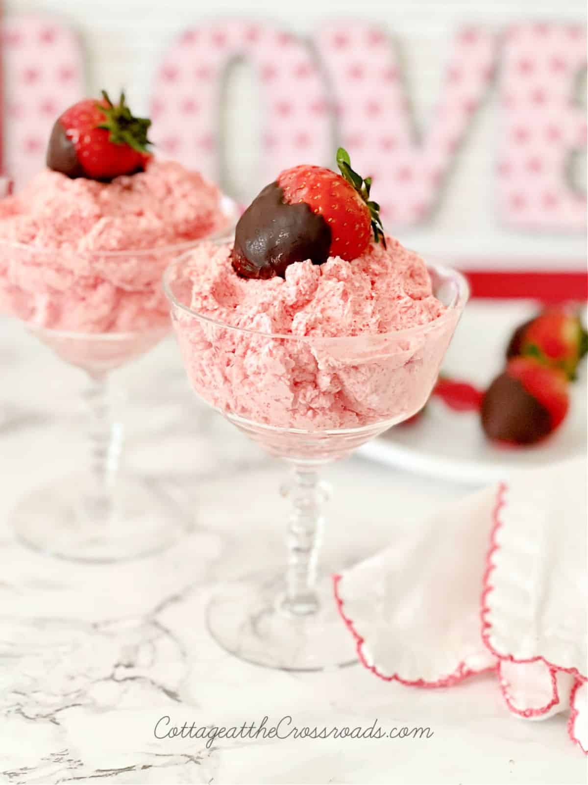 Mouth-watering low-carb strawberry fluffs in tall glasses.