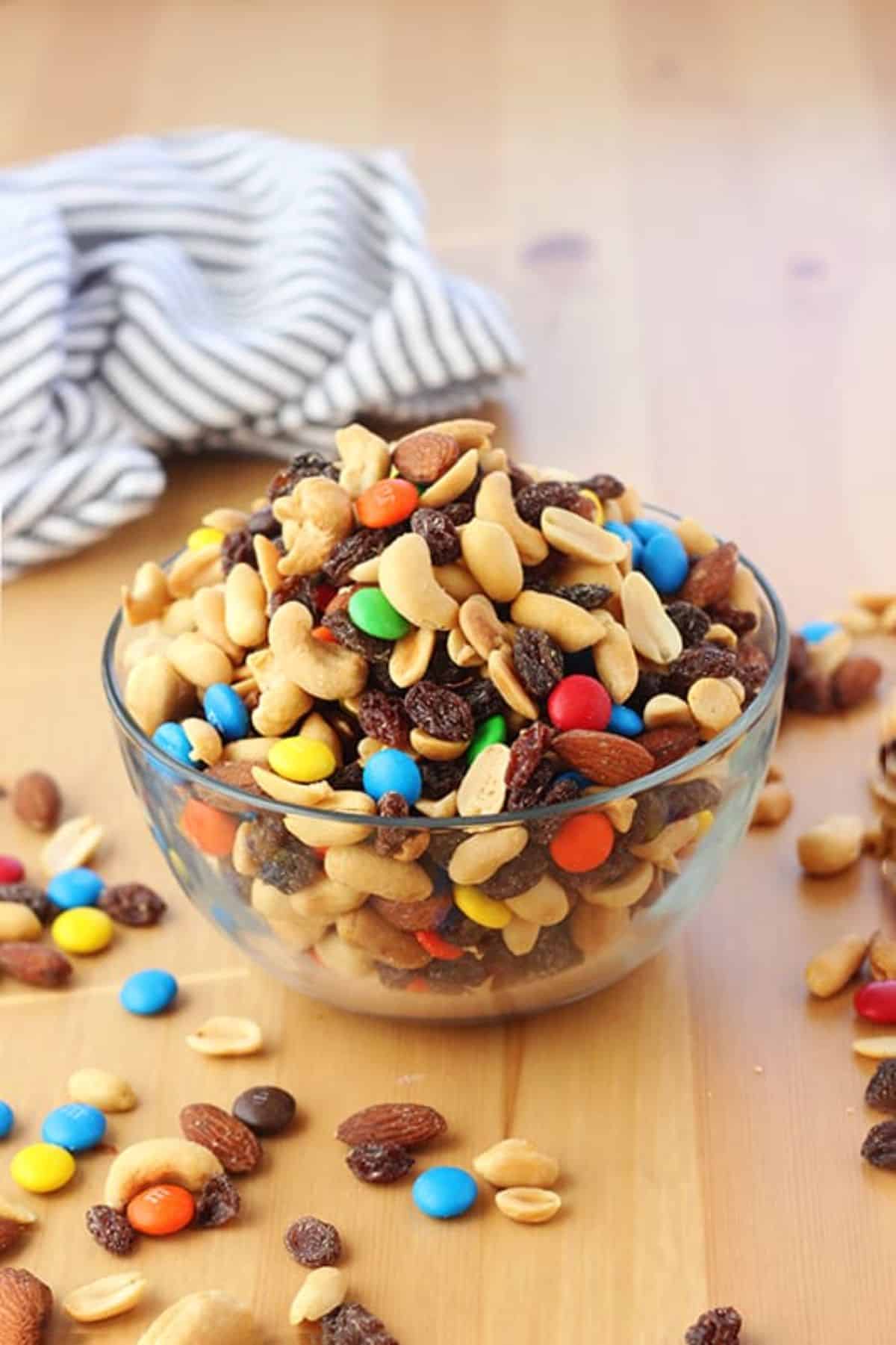 Crunchy classic trail mix in a glass bowl.