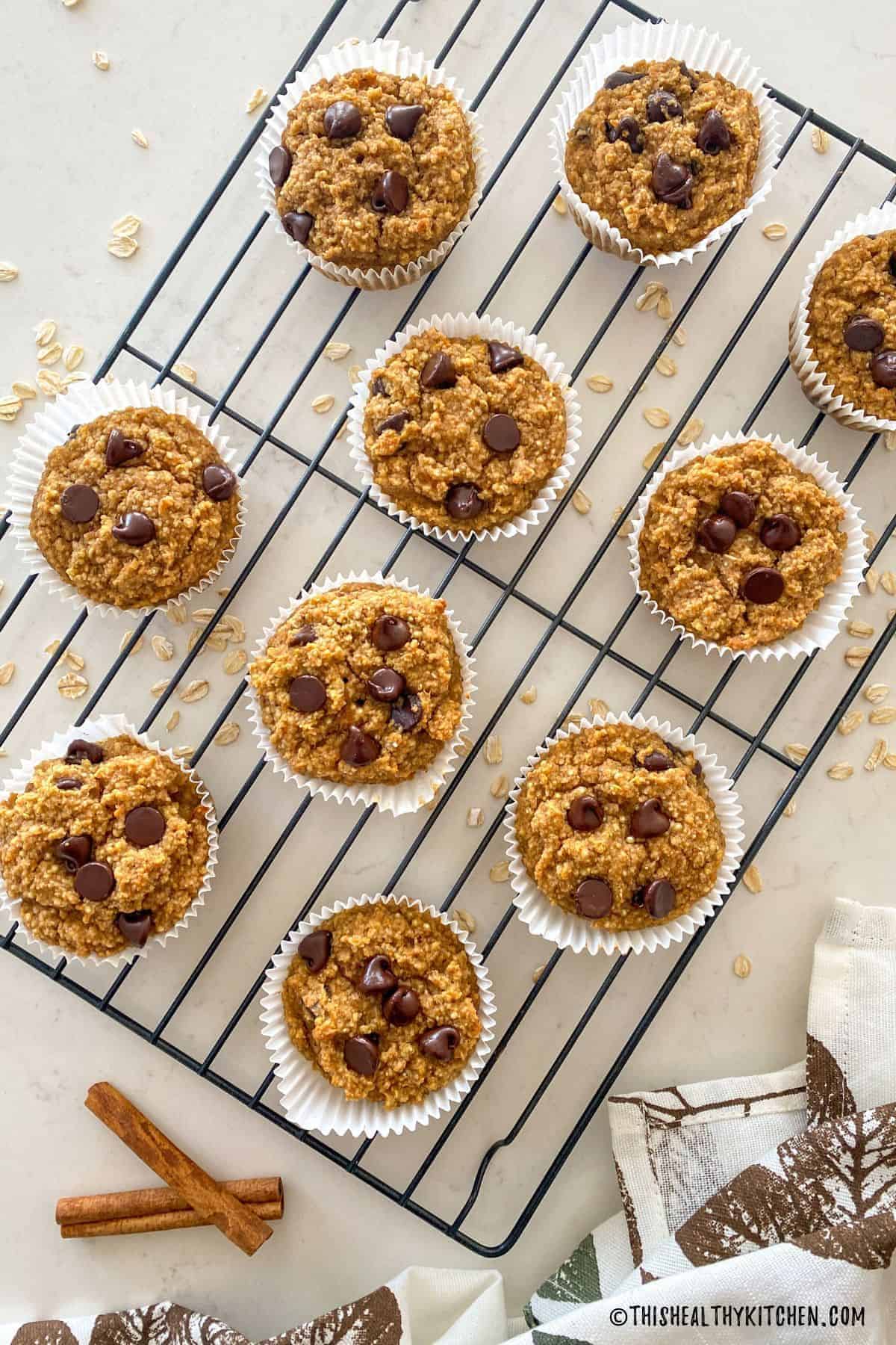 Tasty mini quinoa sweet potato muffins on a resting grid.