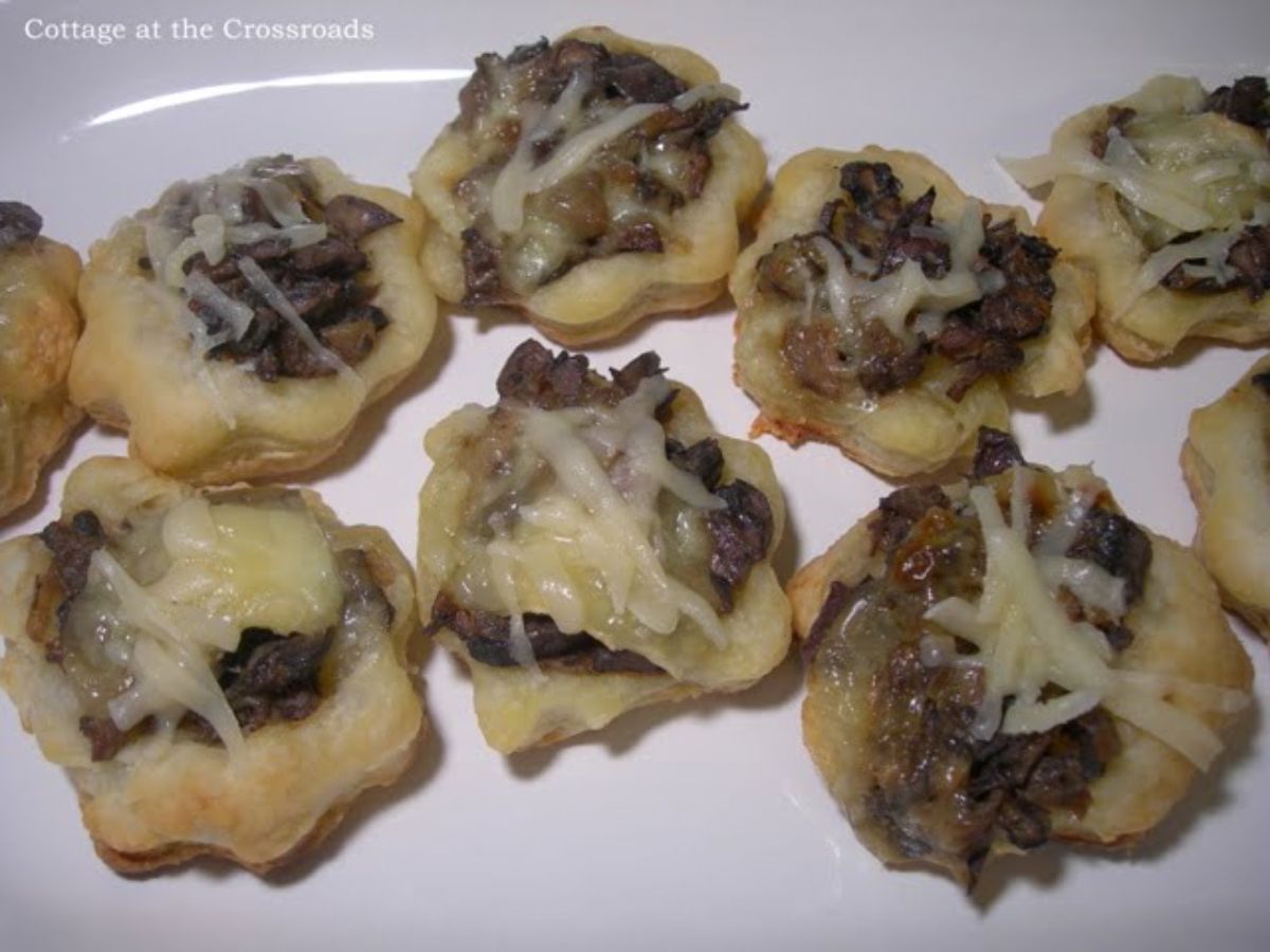 Flavorful mushroom puffs on a white tray.