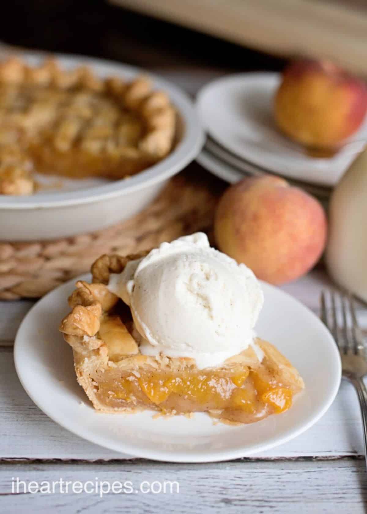 A piece of grandma's peach pie on a white plate.