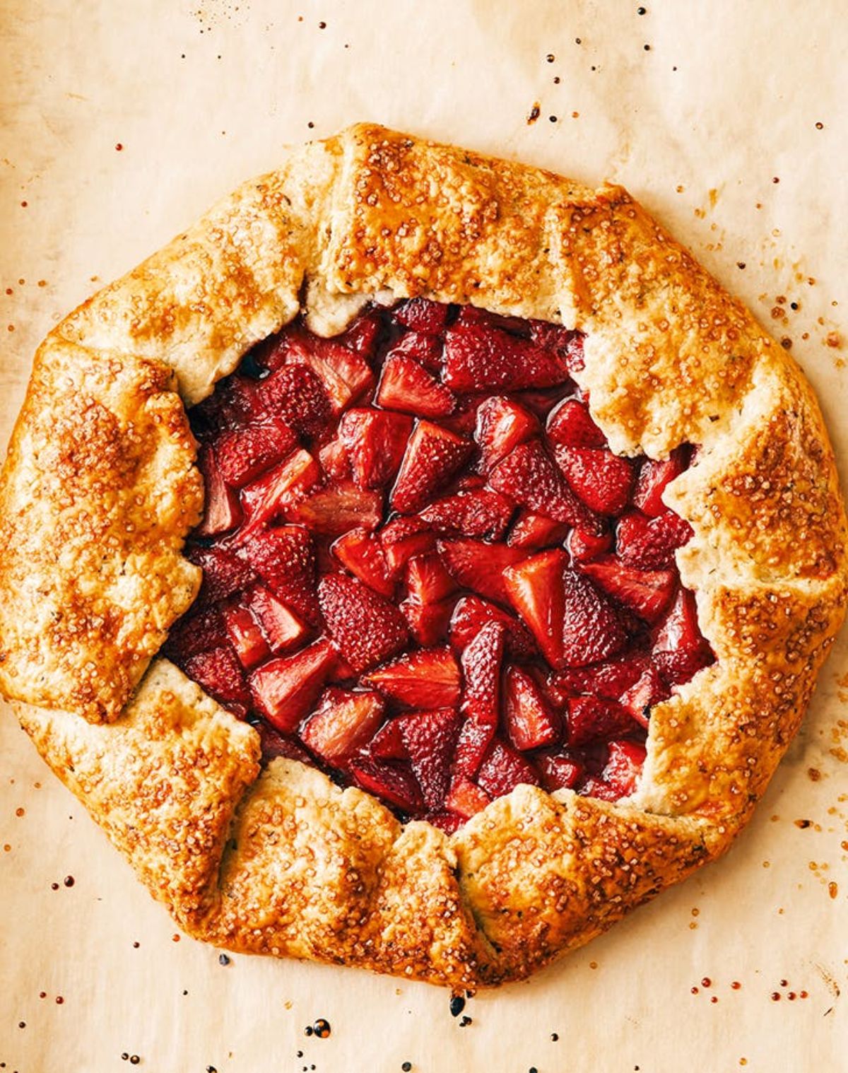 Mouth-watering strawberry galette with whipped cream.