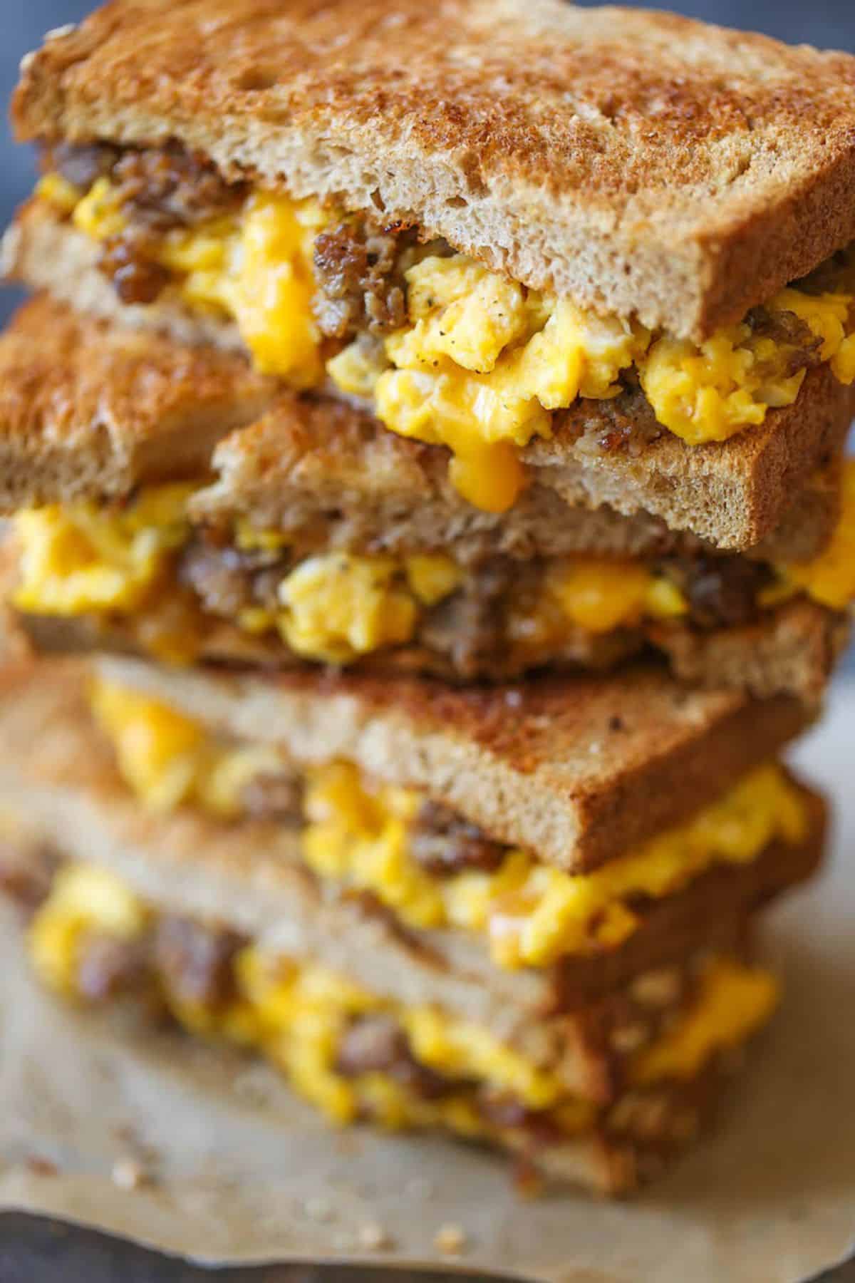 A pile of breakfast grilled cheese sandwiches.