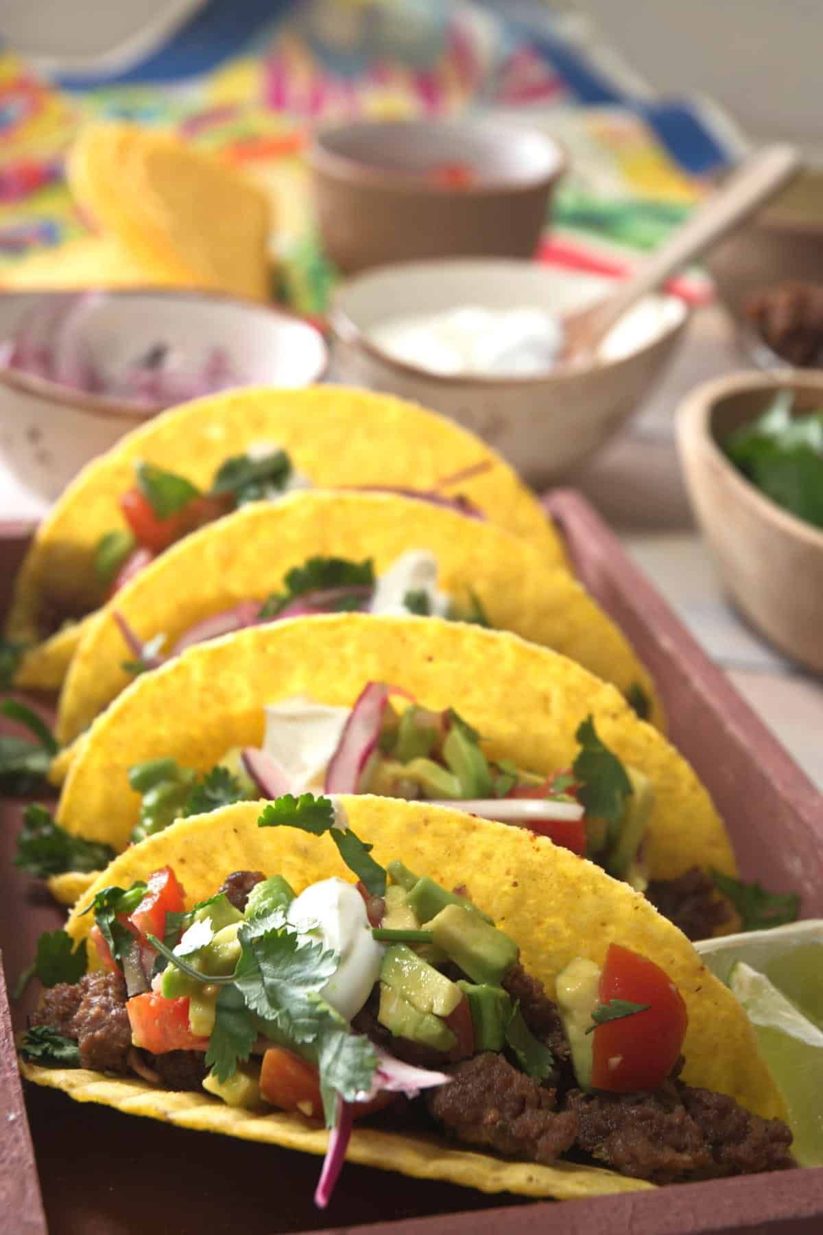 Scrumptious bison tacos on a tray.