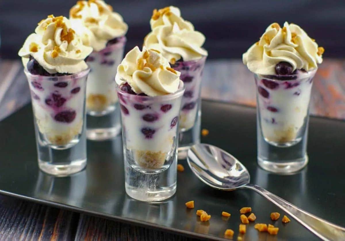 Scrumptious saskatoon berry tiramisu in glass shots.