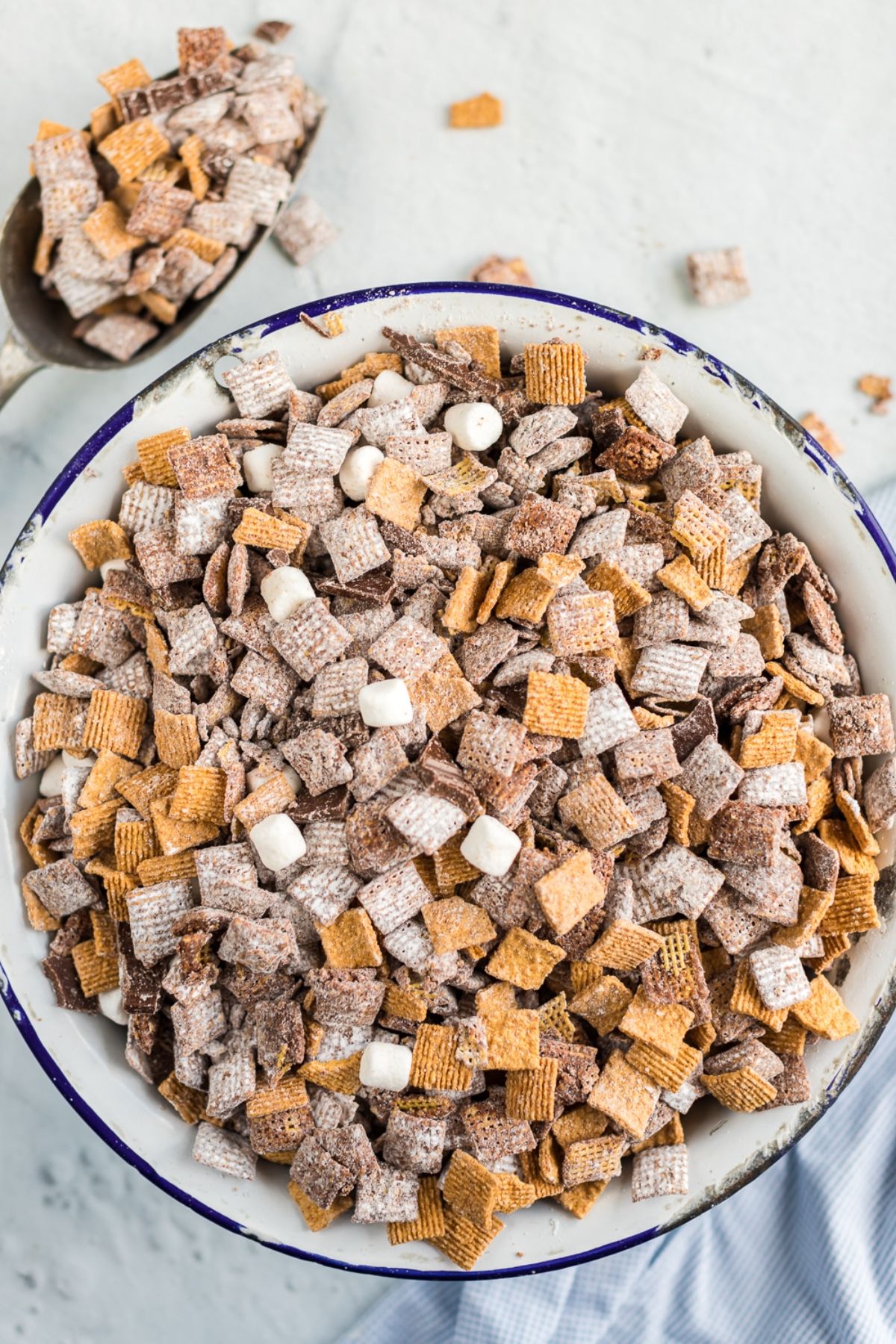 Crunchy s'mores puppy chow in a bowl.