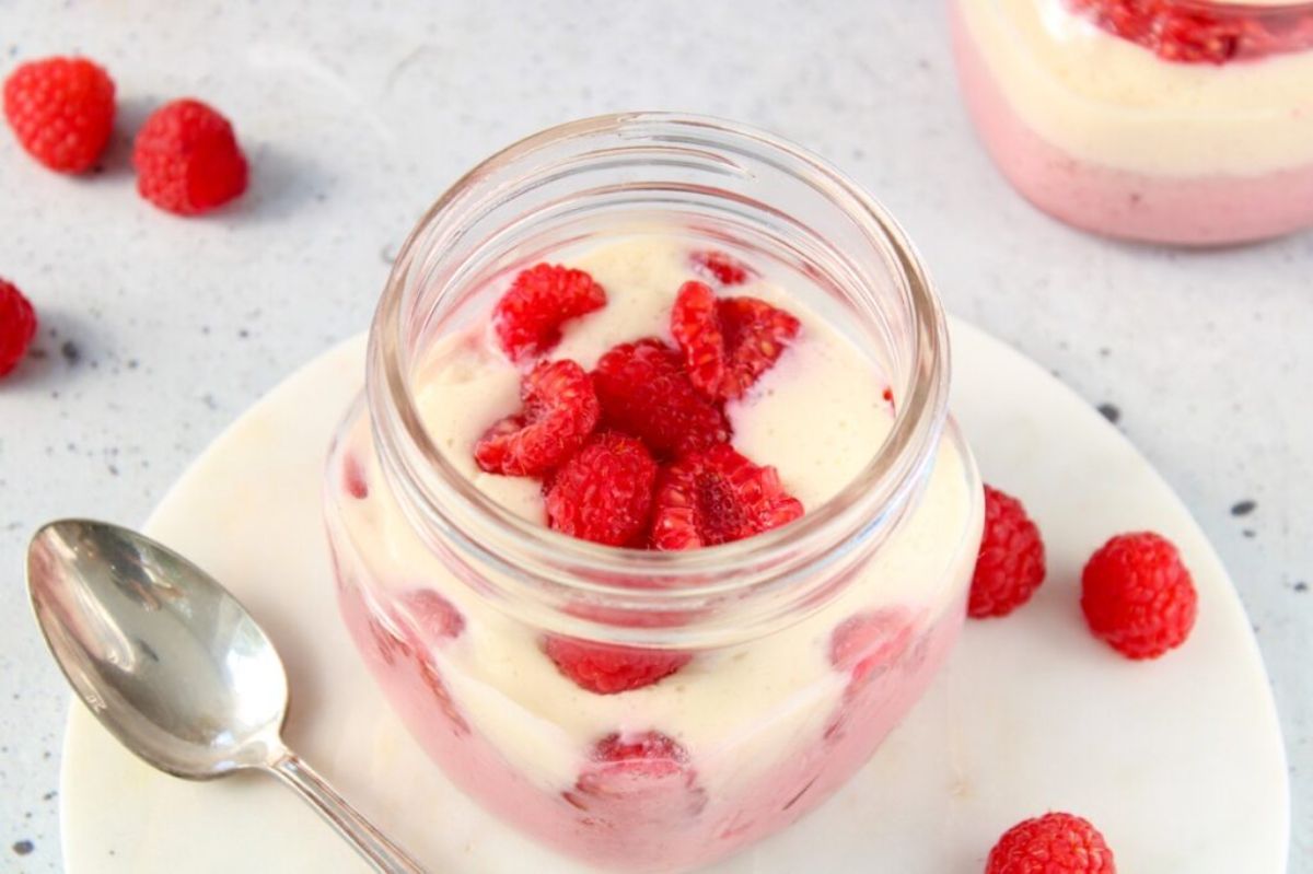 Healthy no-bake silken tofu raspberry mousse in a glass jar.