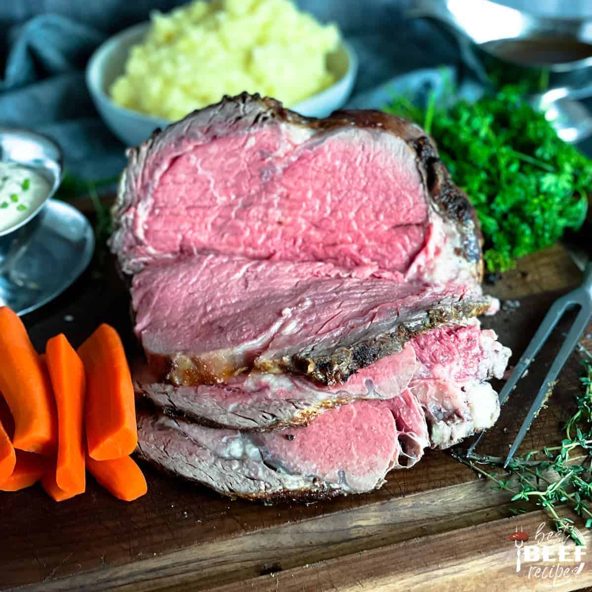 Scrumptious sous vide prime rib on awooden tray.