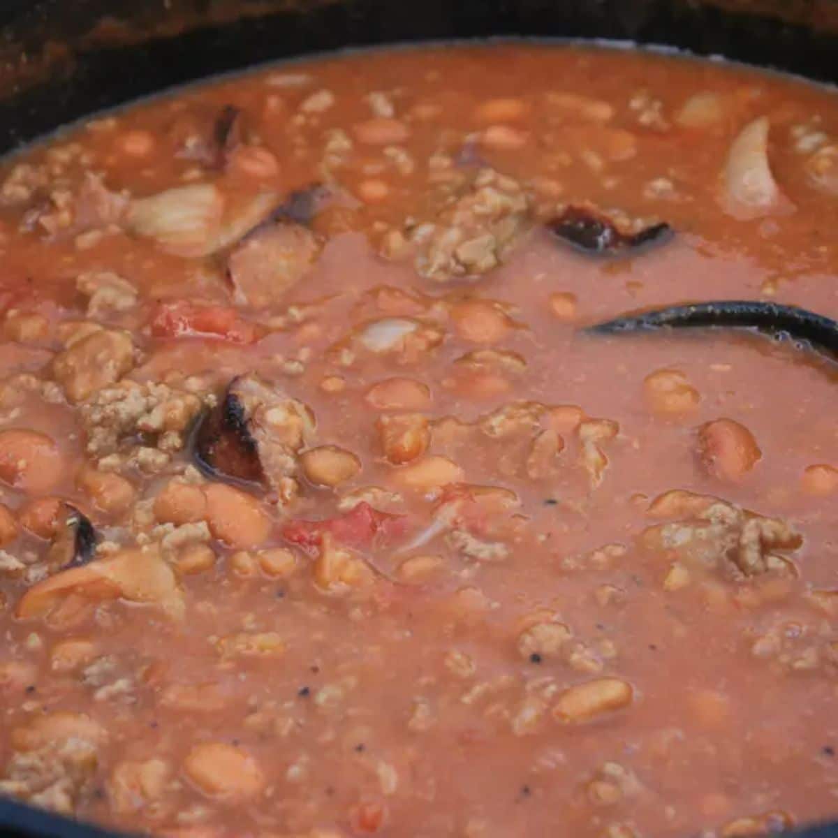 Flavorful john wayne beans in a skillet.