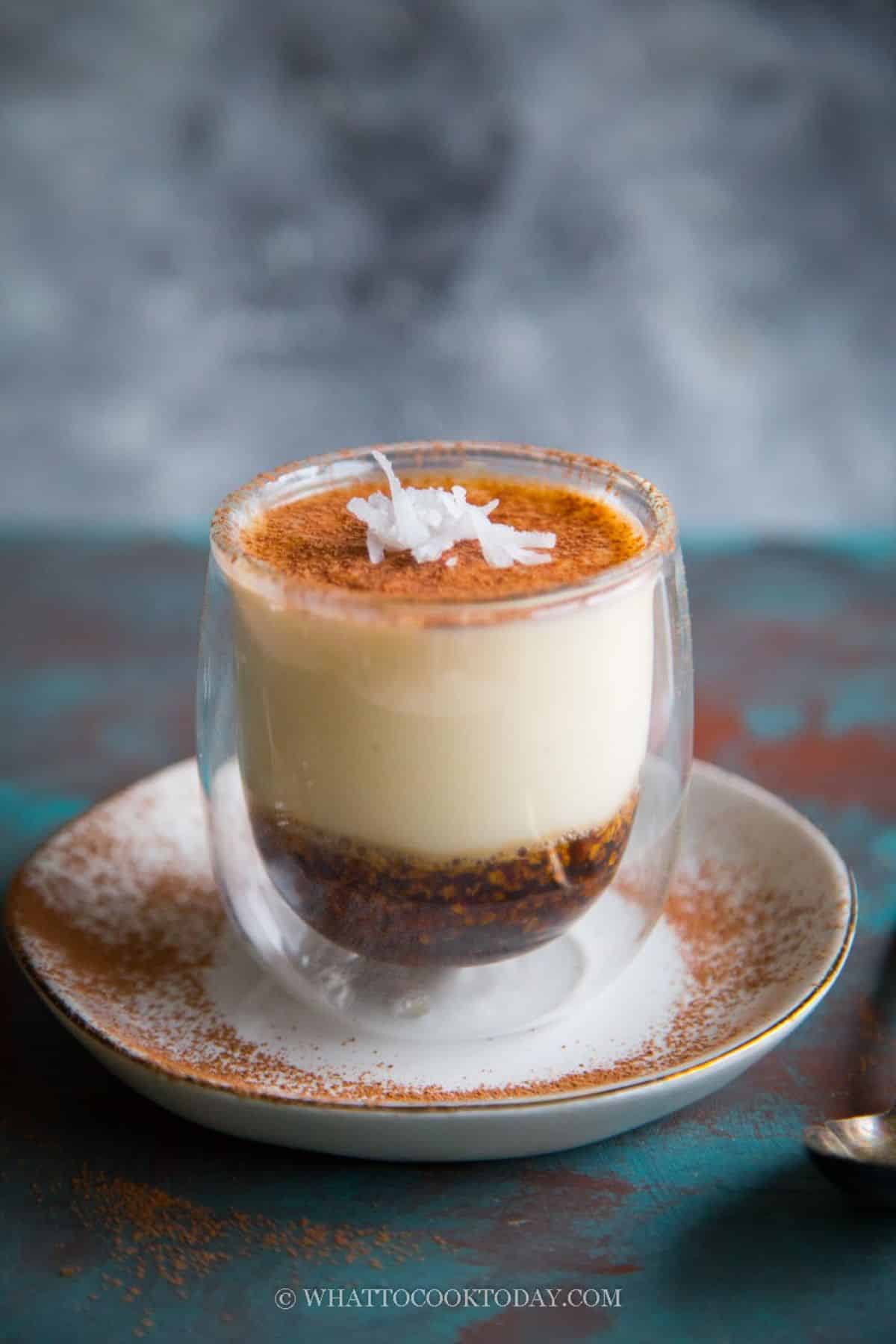 Flavorful easy eggless silken tofu tiramisu in a glass cup.