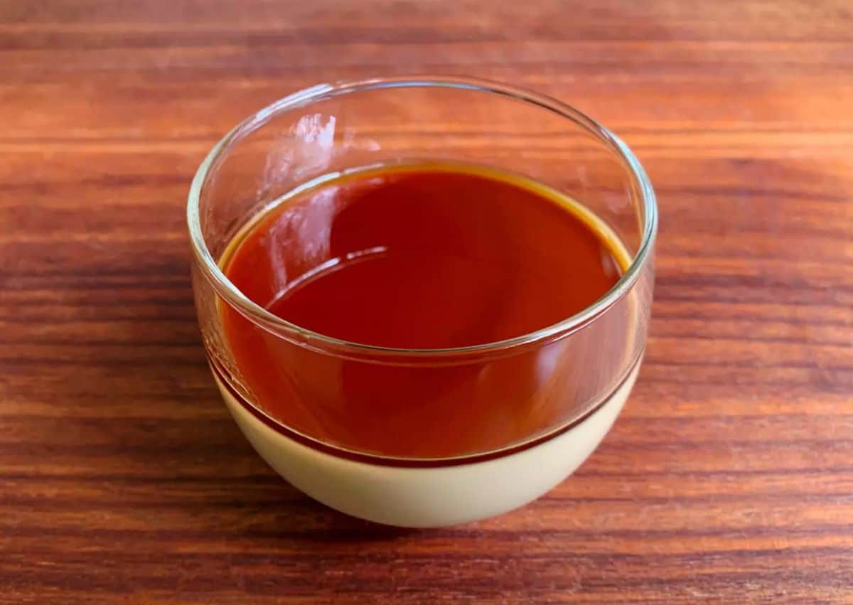 Fresh coffee panna cotta with kahlua in a glass bowl.