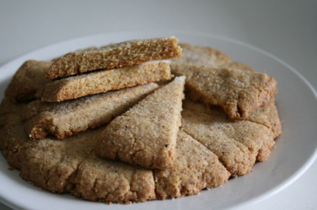 Tasteful brazil nut shortbread on a white plate.