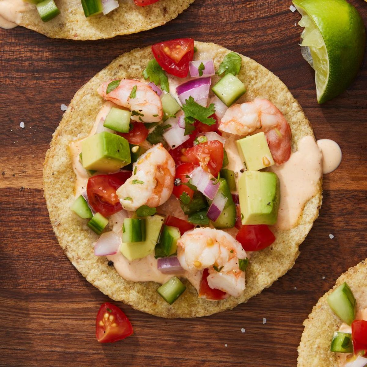 Tasty shrimp ceviche on a wooden table.