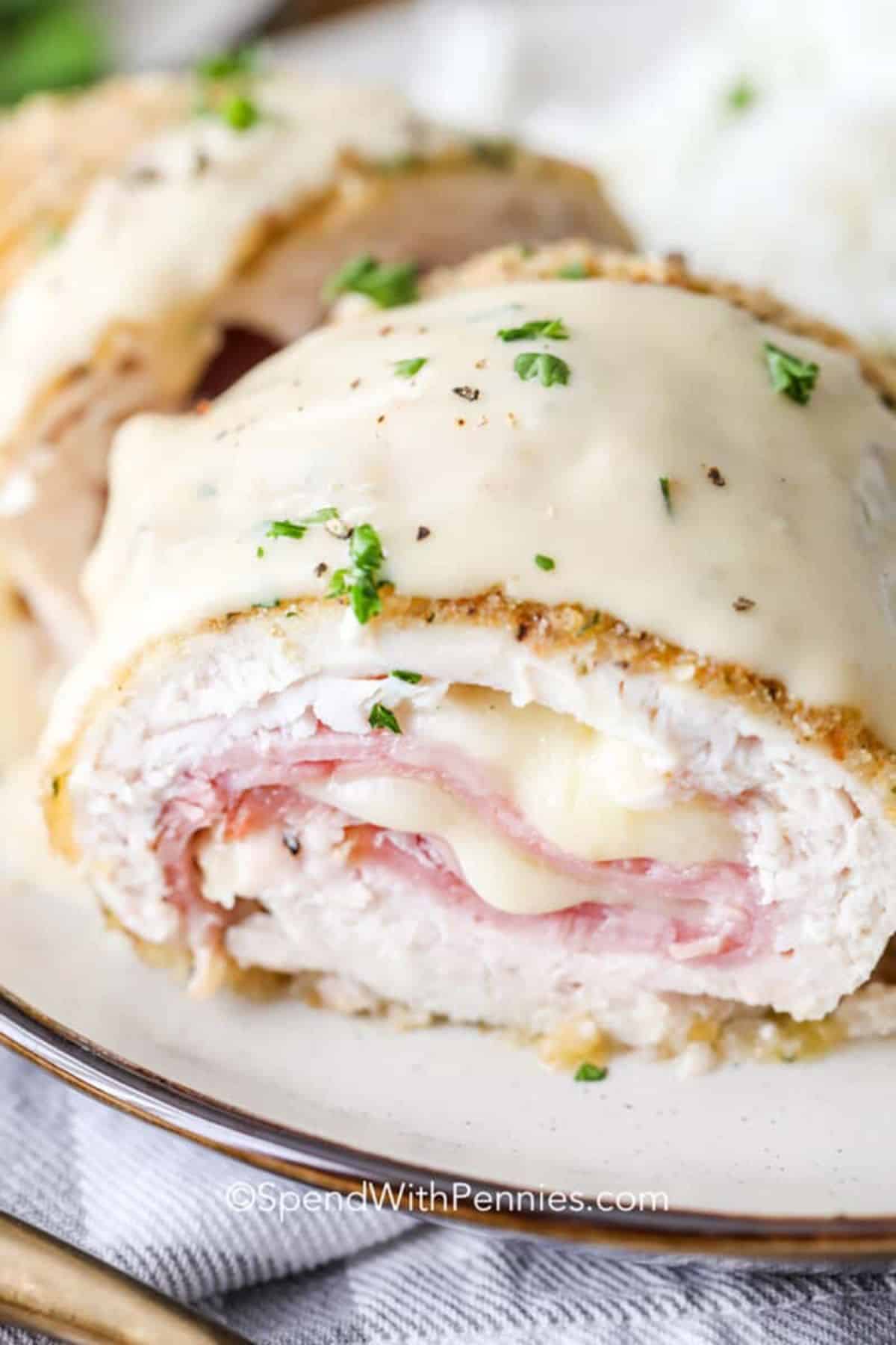 Scrumptious chicken cordon bleu on a plate.