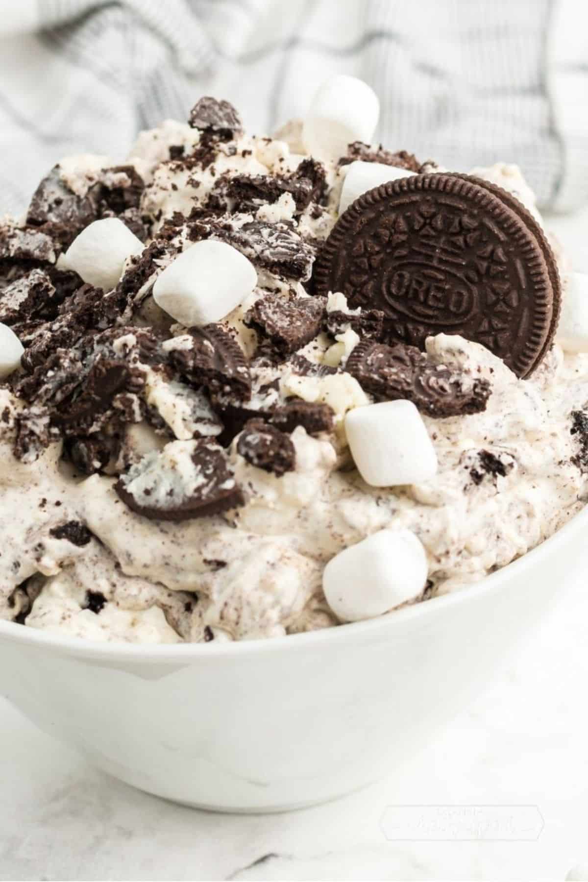 Creamy oreo fluff in a white bowl.