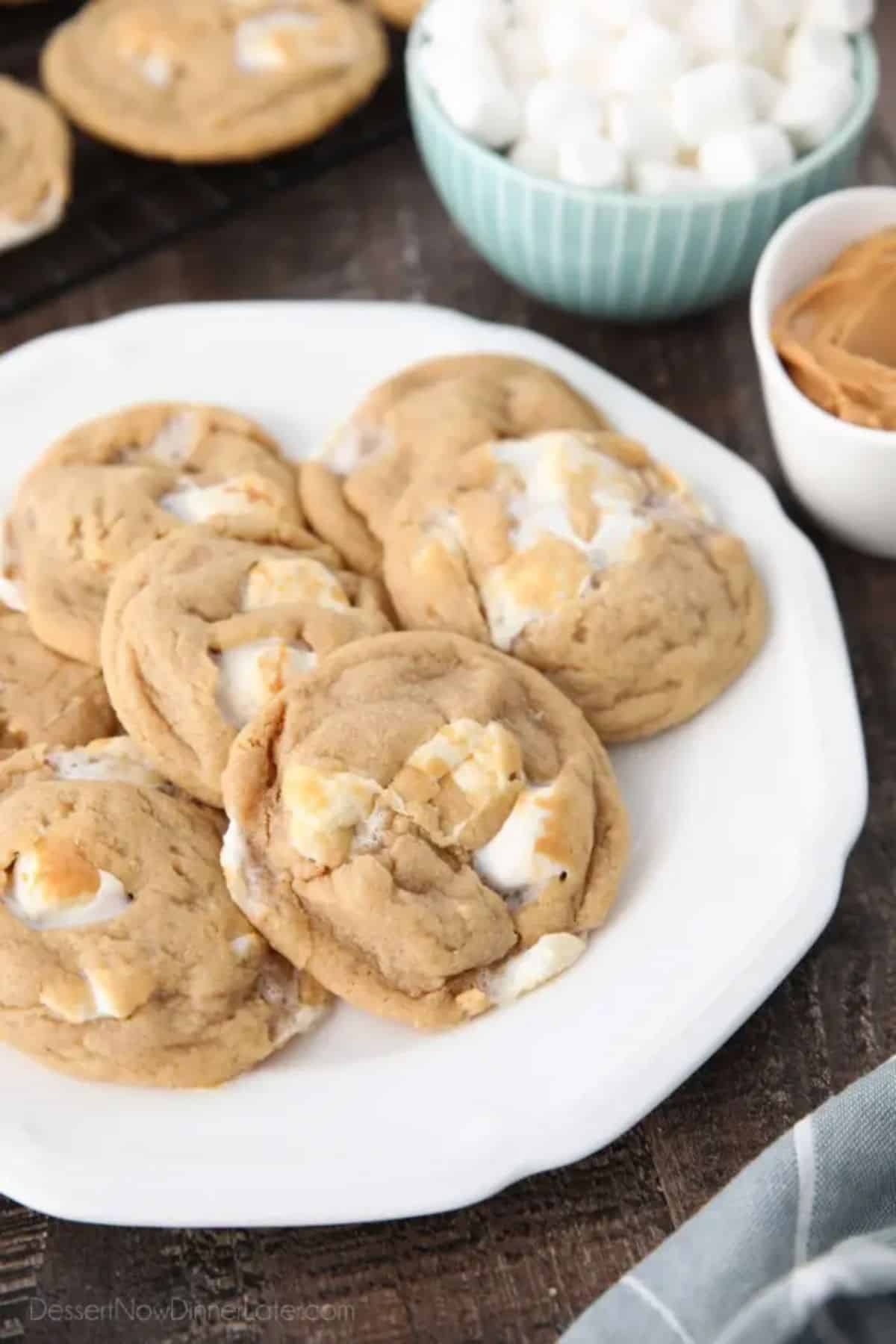 Crunchy fluffernutter cookies on a white plate.