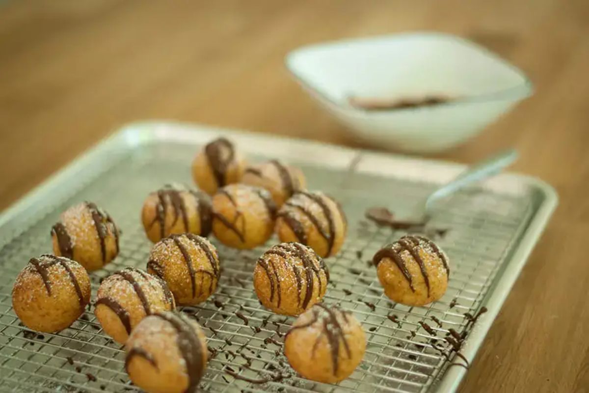 Crunchy tofu donut holes on a resting grid.