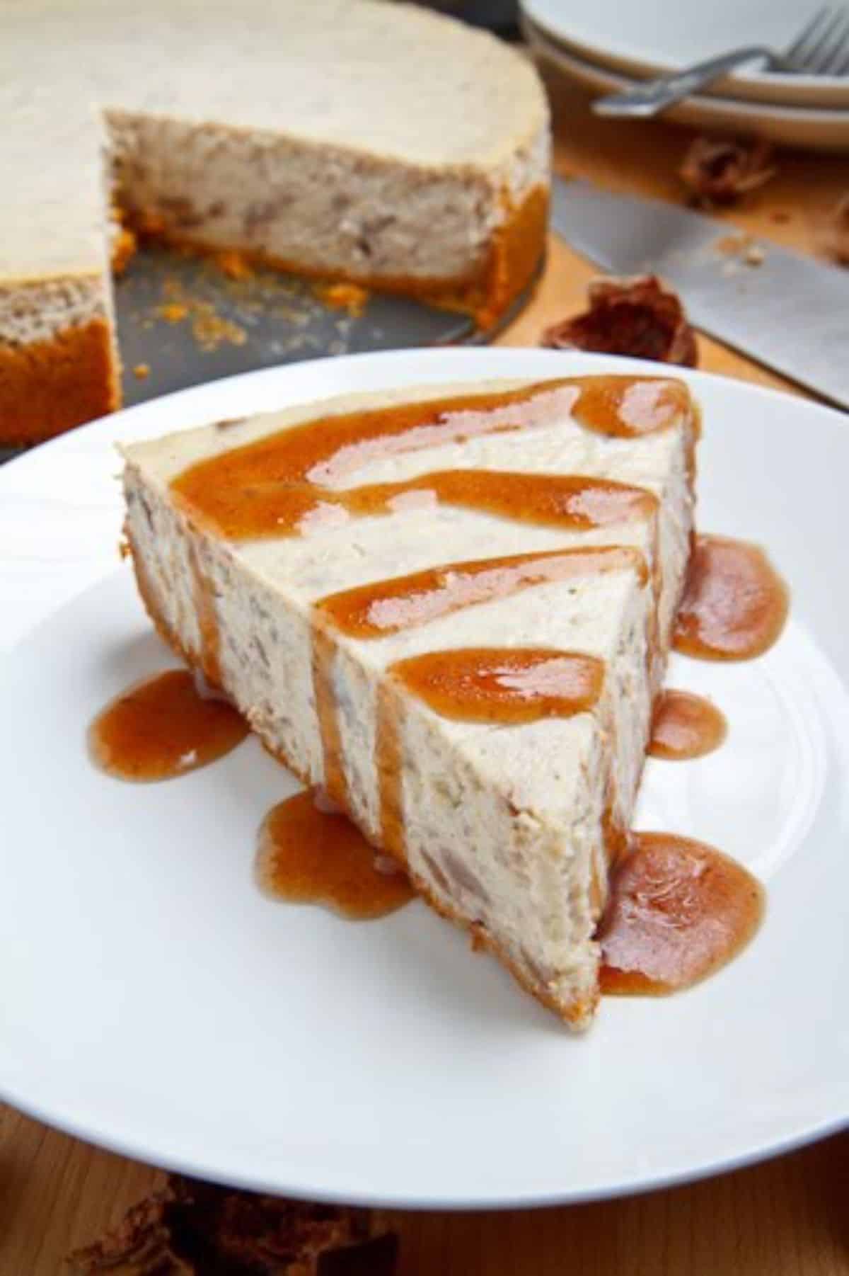 A piece of chestnut cheesecakeon a white plate.