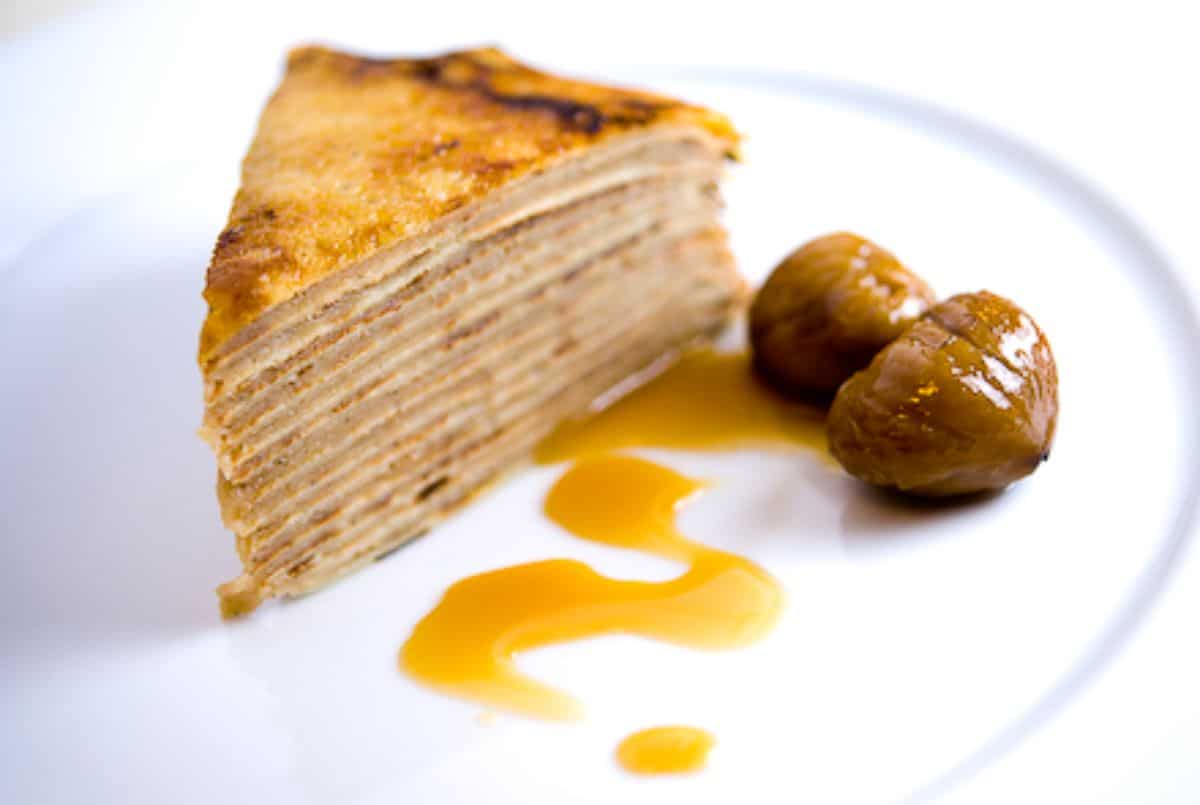 Flavorful chestnut crepe on a white plate.