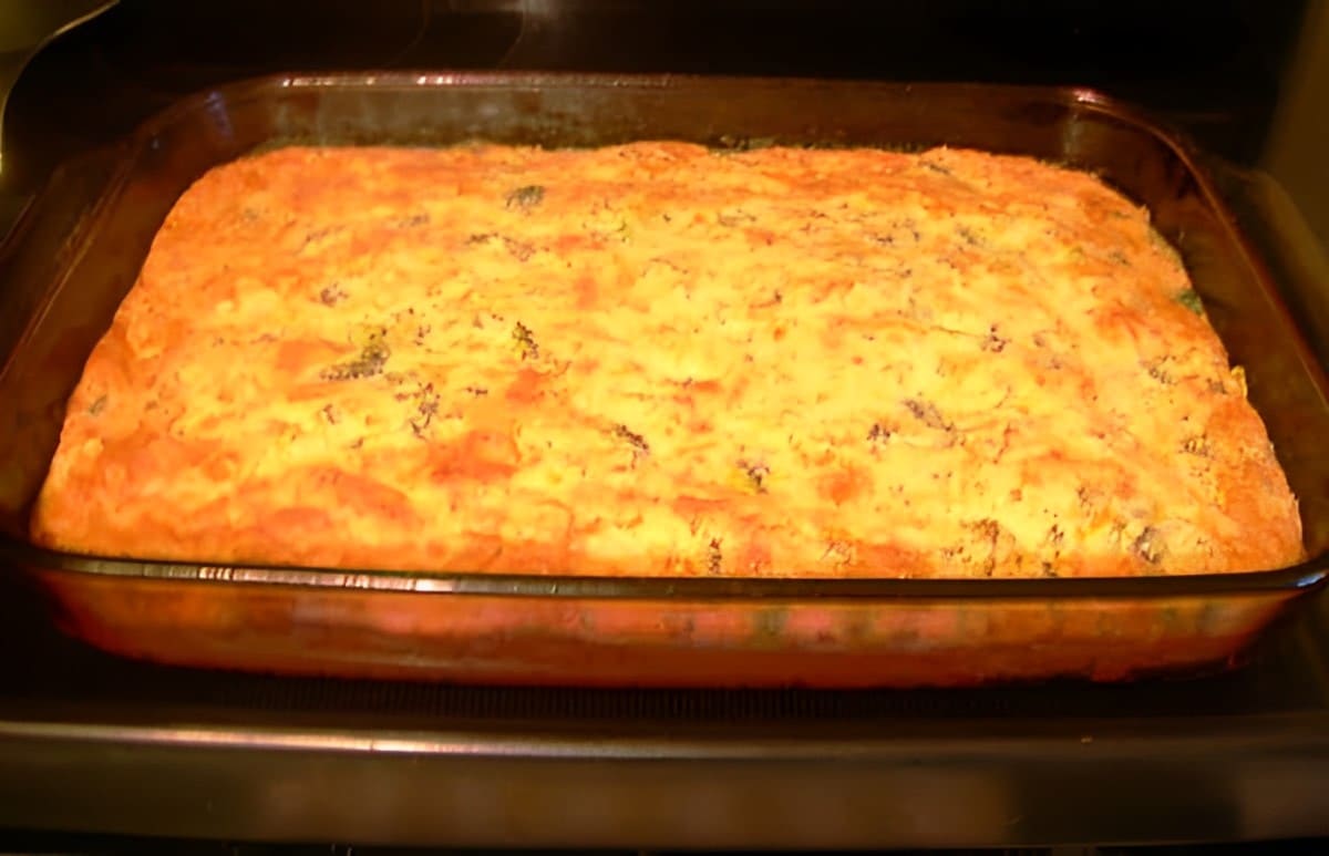 Crunchy broccoli cornbread in a glass casserole.